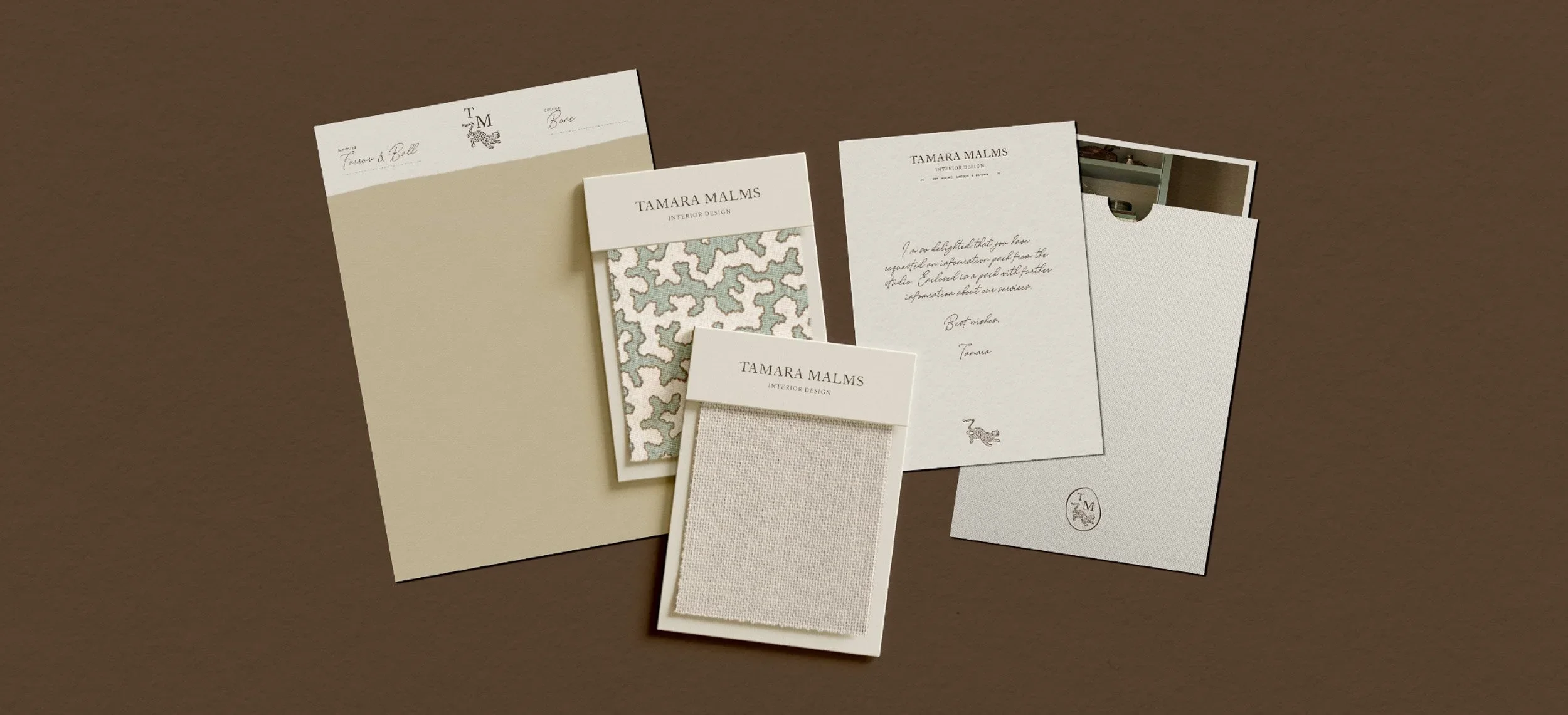 Tamara Malms interior design branding materials including textured fabric swatches and a Farrow and Ball paint sample
