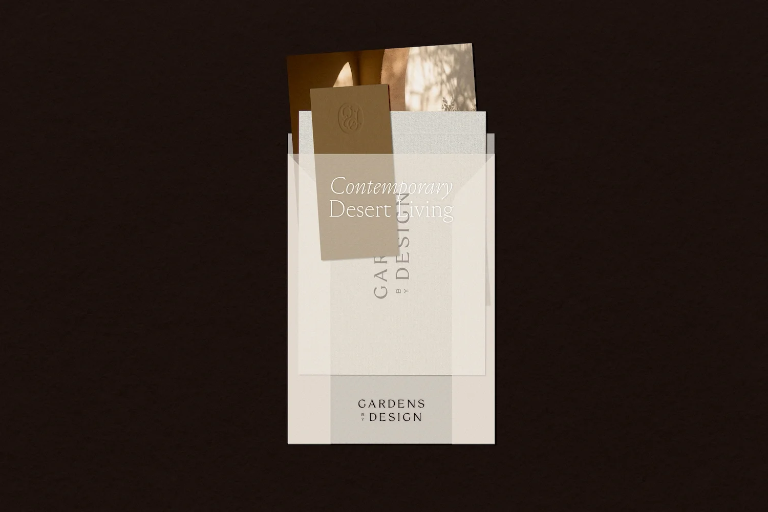 Premium translucent vellum envelope displaying Gardens by Design branding and contemporary desert living stationery