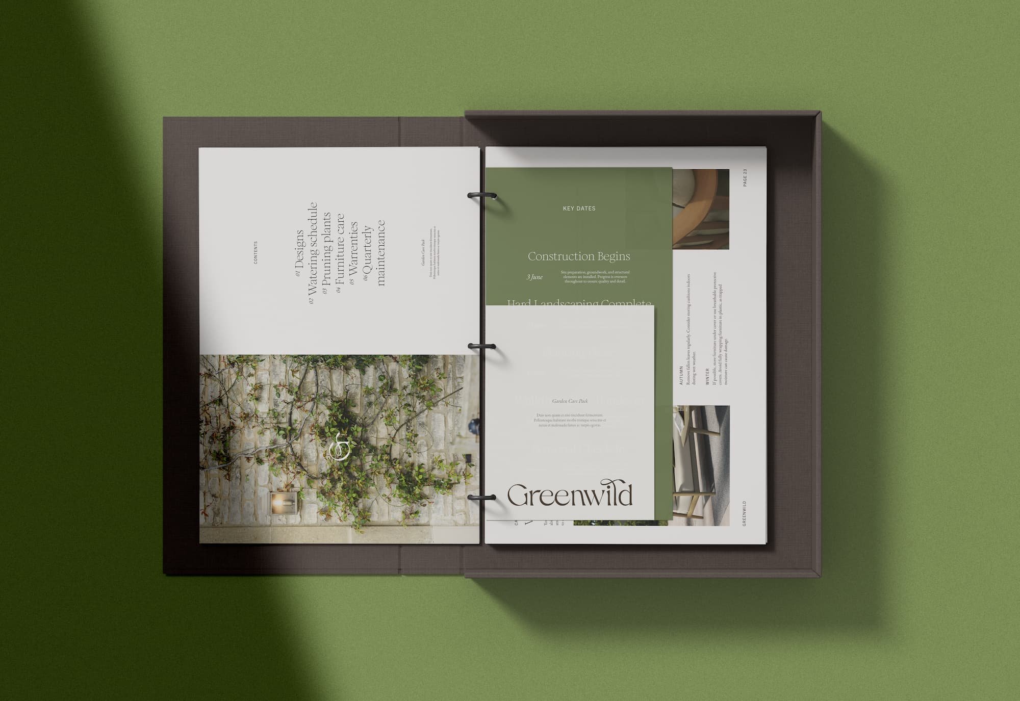 Open luxury ring binder showcasing a Greenwild garden care pack with maintenance schedules and high-end brand photography