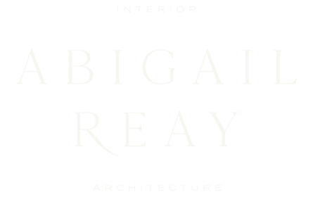 Abigail Reay Interior Architecture stacked logo in elegant cream serif typography set against a minimalist black background