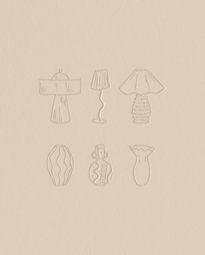 Six minimalist interior design icons including lamps and vases embossed onto a textured cream coloured paper background