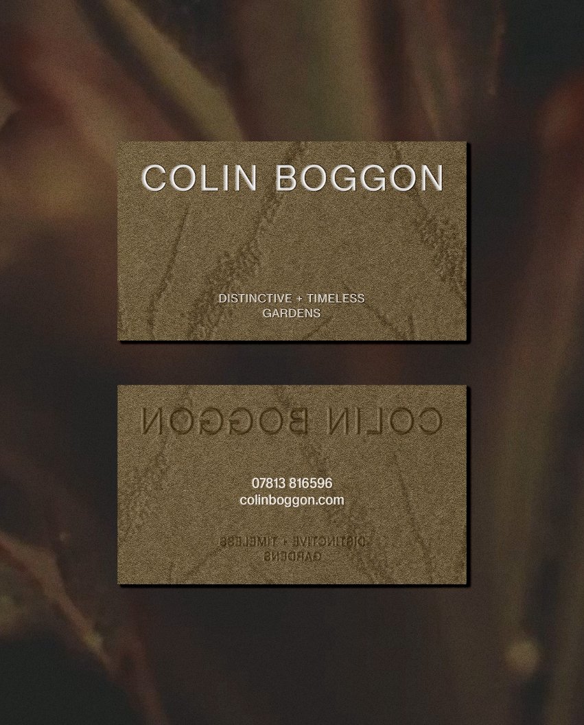Front and back of a textured olive green business card for Colin Boggon displaying contact details and garden design motifs
