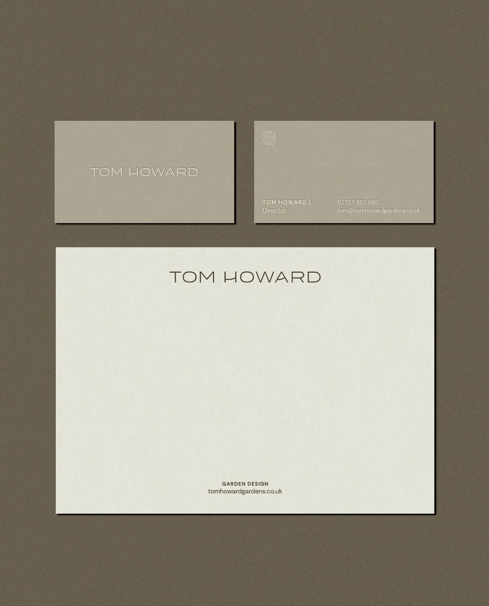 Minimalist business cards and letterhead for Tom Howard Garden Design featuring a clean layout and modern serif typography