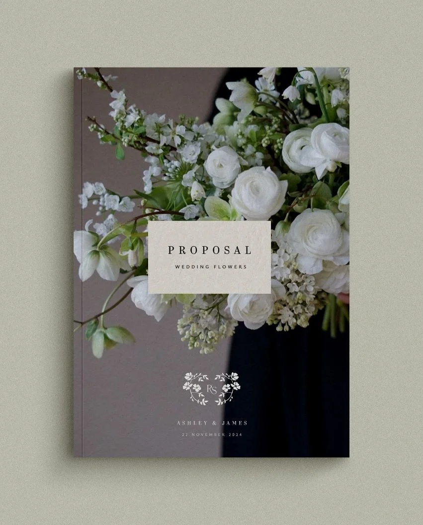 Wedding floral proposal cover featuring a large white ranunculus bouquet and elegant serif typography on a beige label.