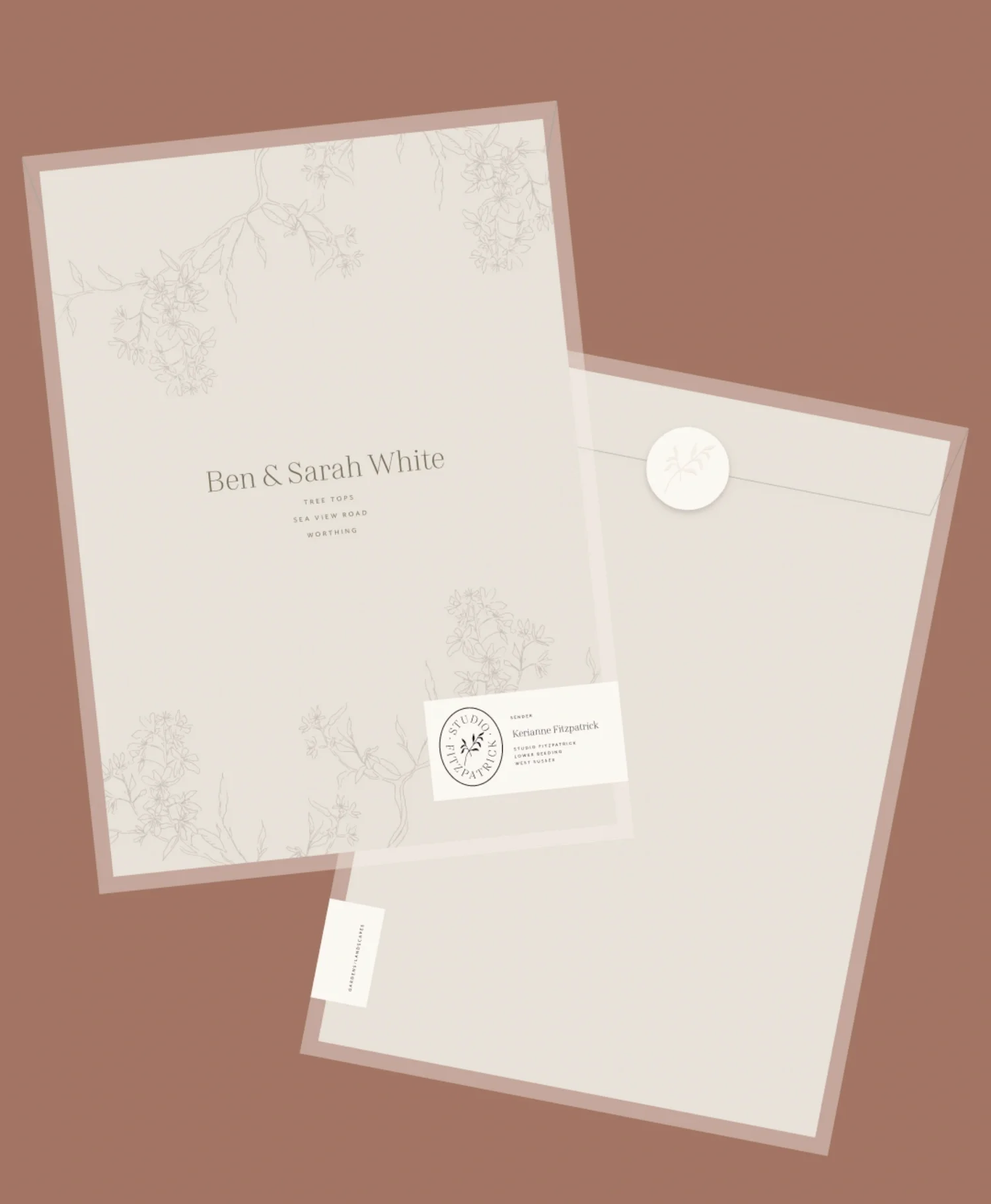 Branded corporate stationery kit containing a translucent presentation sleeve, elegant letterhead and sealed envelope