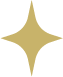 A star-shaped pattern with a gold or yellow glittery appearance on a dark background.