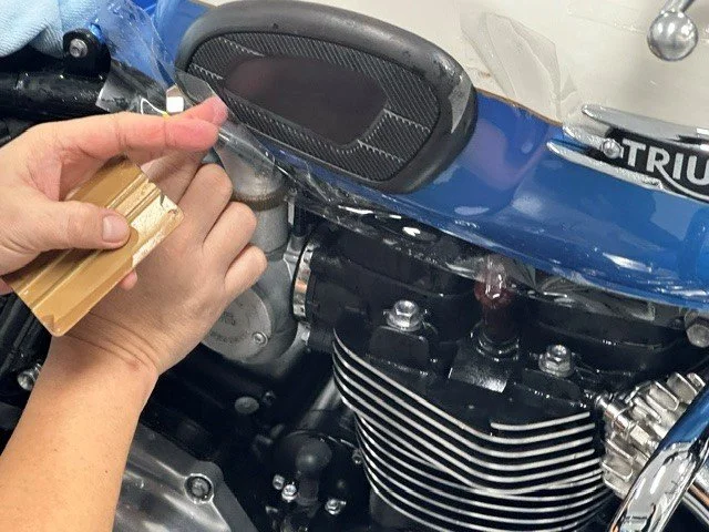 Two wheels deserve protection too.

This Triumph received full-bike PPF, protecting the painted surfaces from the everyday marks, stone chips and wear that come with actually riding it.

Motorcycles are a very different installation from cars &mdash;
