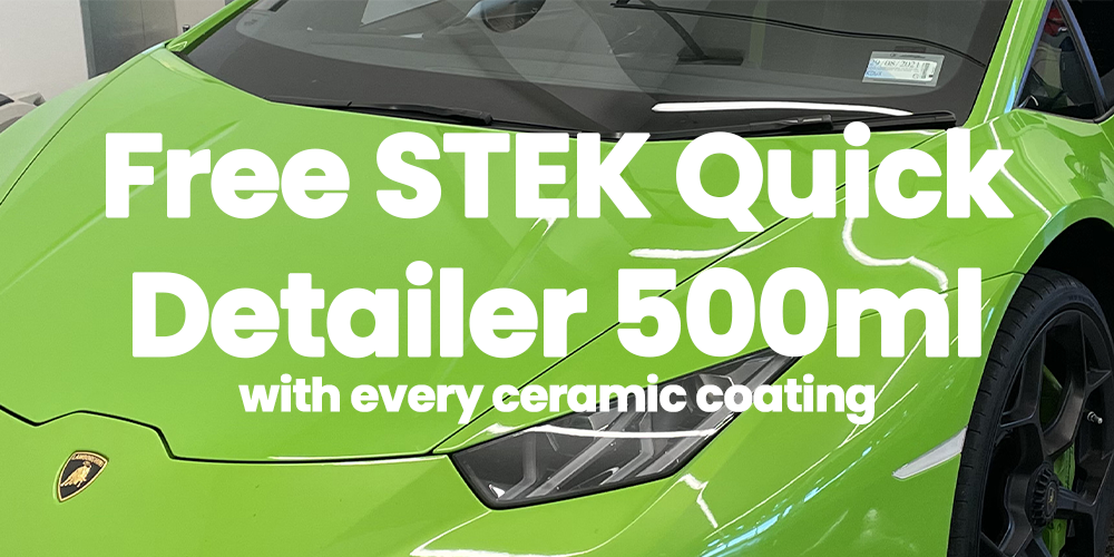 Close-up of a bright green sports car, specifically a Lamborghini, with promotional text overlayed that says 'Free STEK Quick Detailer 500ml with every ceramic coating'.