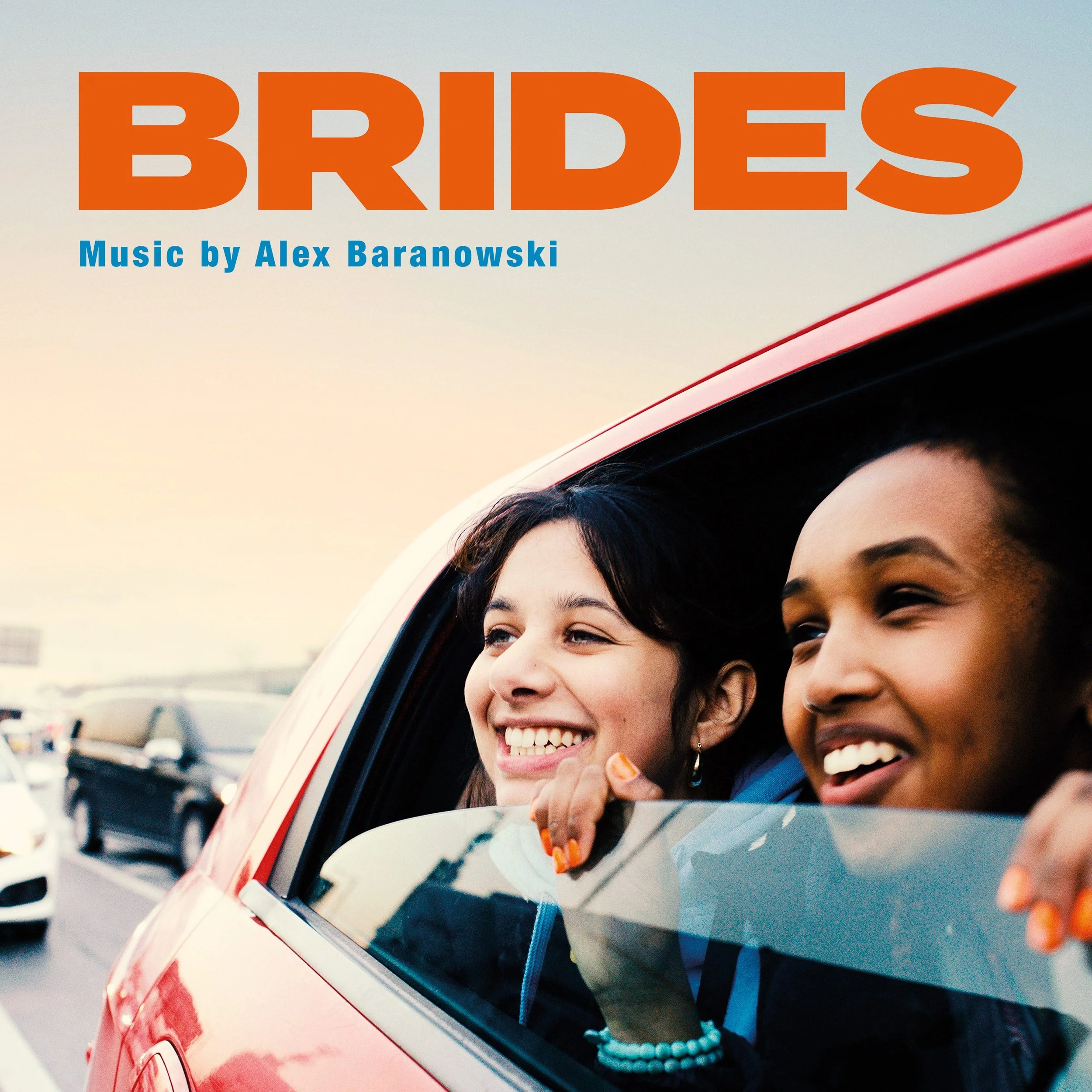 Poster for the movie "Brides"  Two young women smiling and looking out of a car window during sunset, with a highway and other cars in the background, with music by Alex Baranowski.