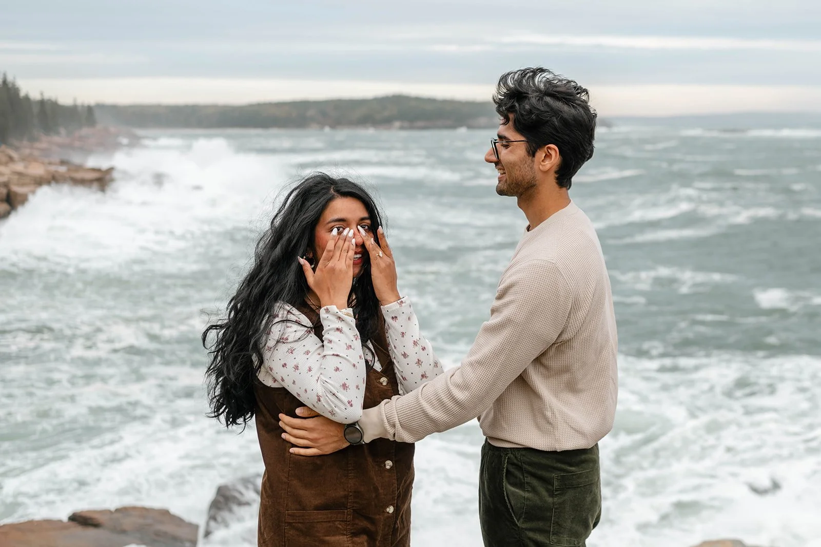 maine surprise proposal along the coast overlooking ocean