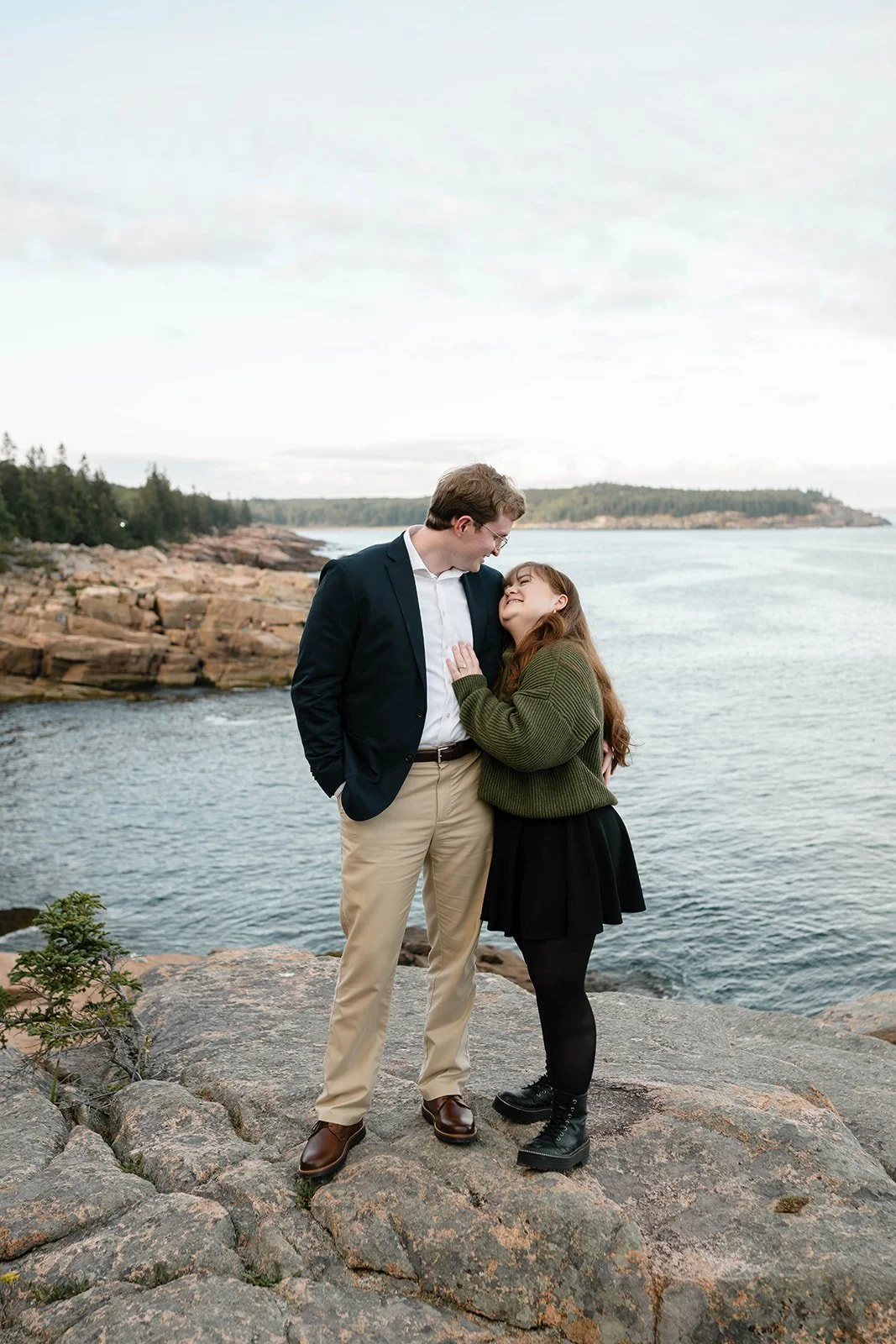 maine surprise proposal along the coast overlooking ocean