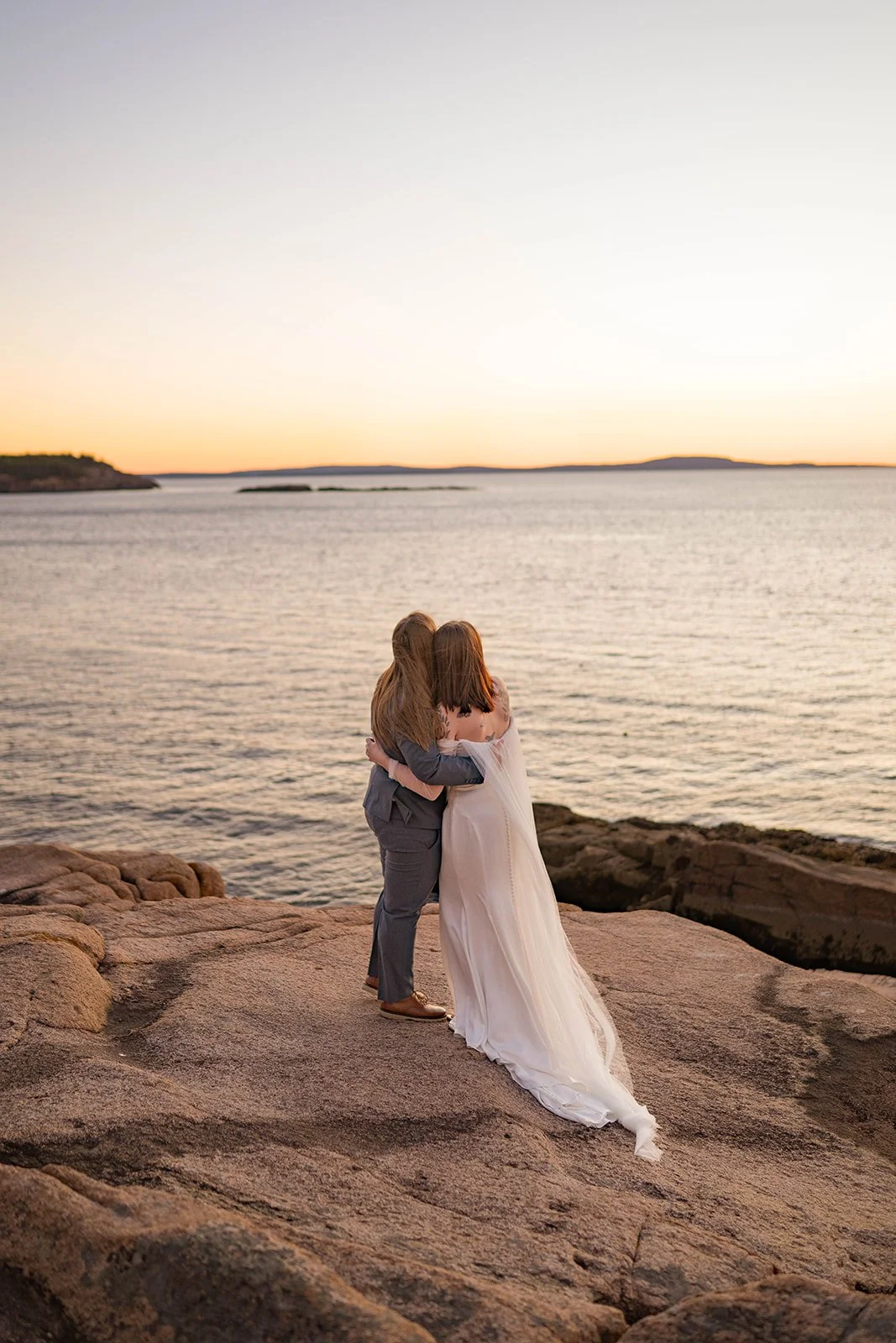 lgbtq elopement along the coast of maine during sunrise