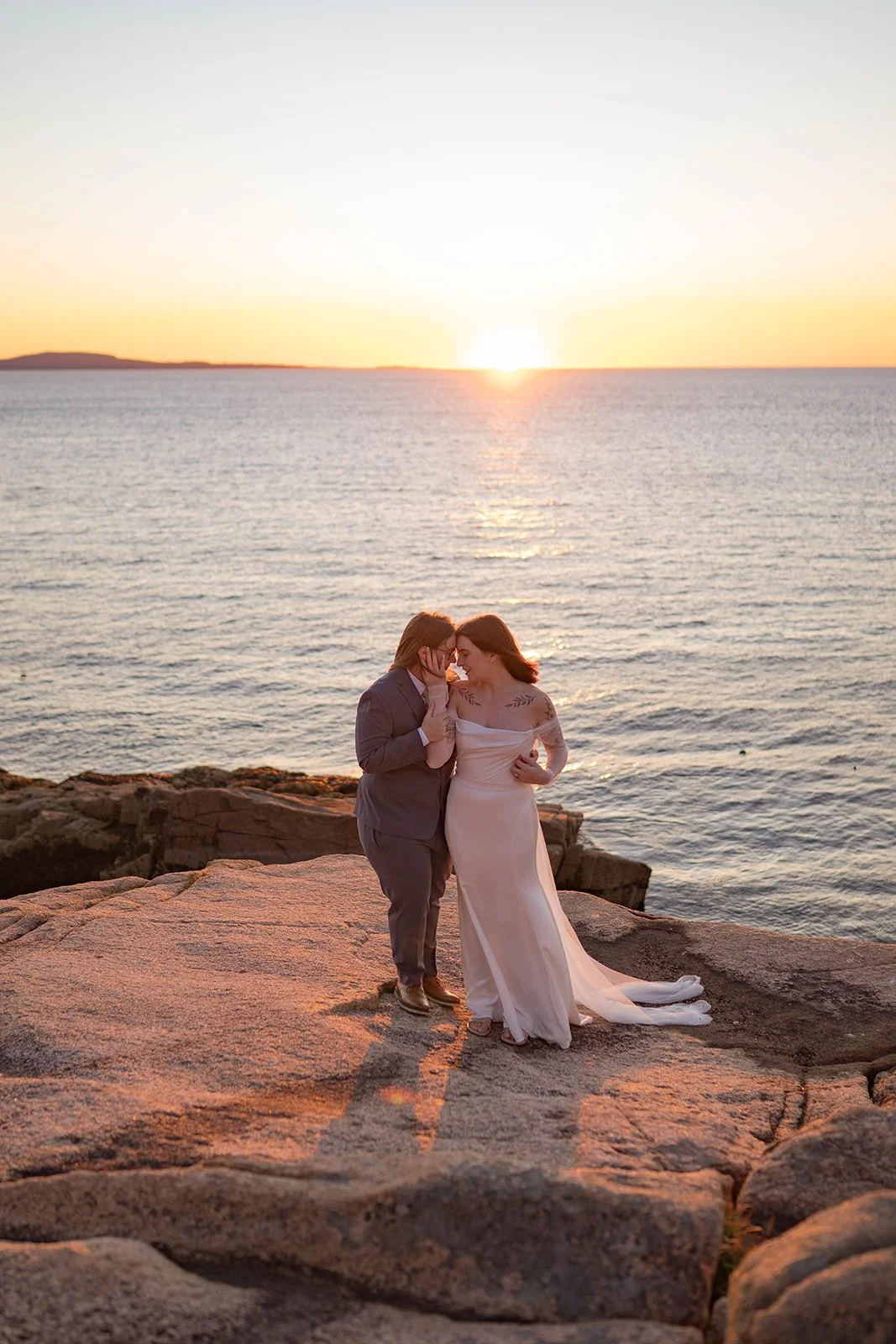 lgbtq elopement along the coast of maine during sunrise
