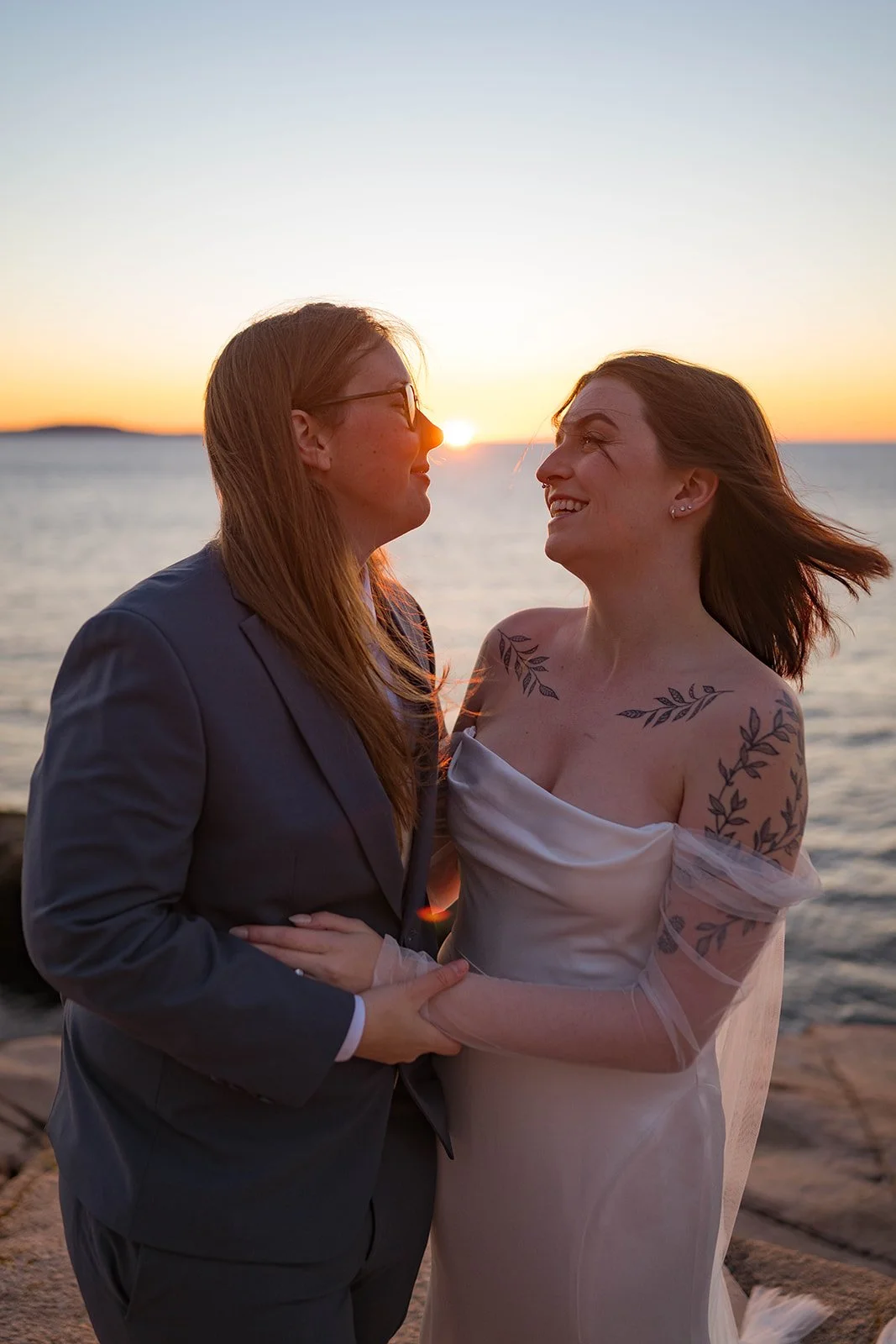 lgbtq elopement along the coast of maine during sunrise