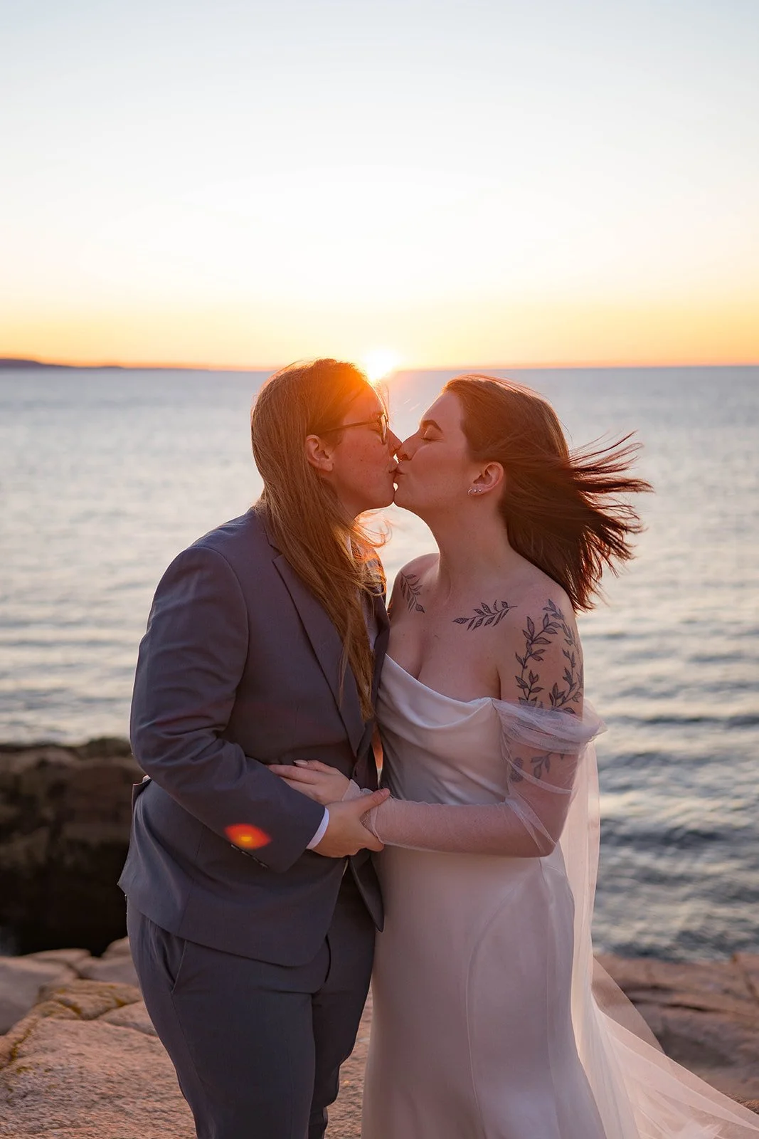 lgbtq elopement along the coast of maine during sunrise