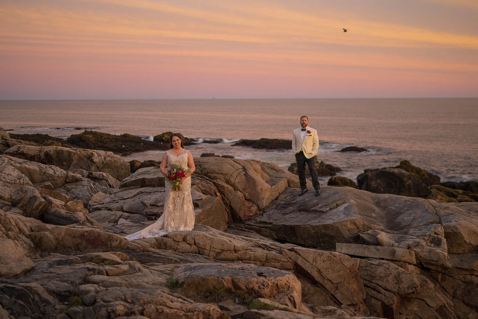 romantic elopement along the coast of maine during sunset