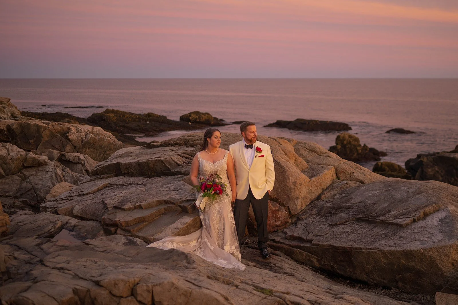 romantic elopement along the coast of maine during sunset