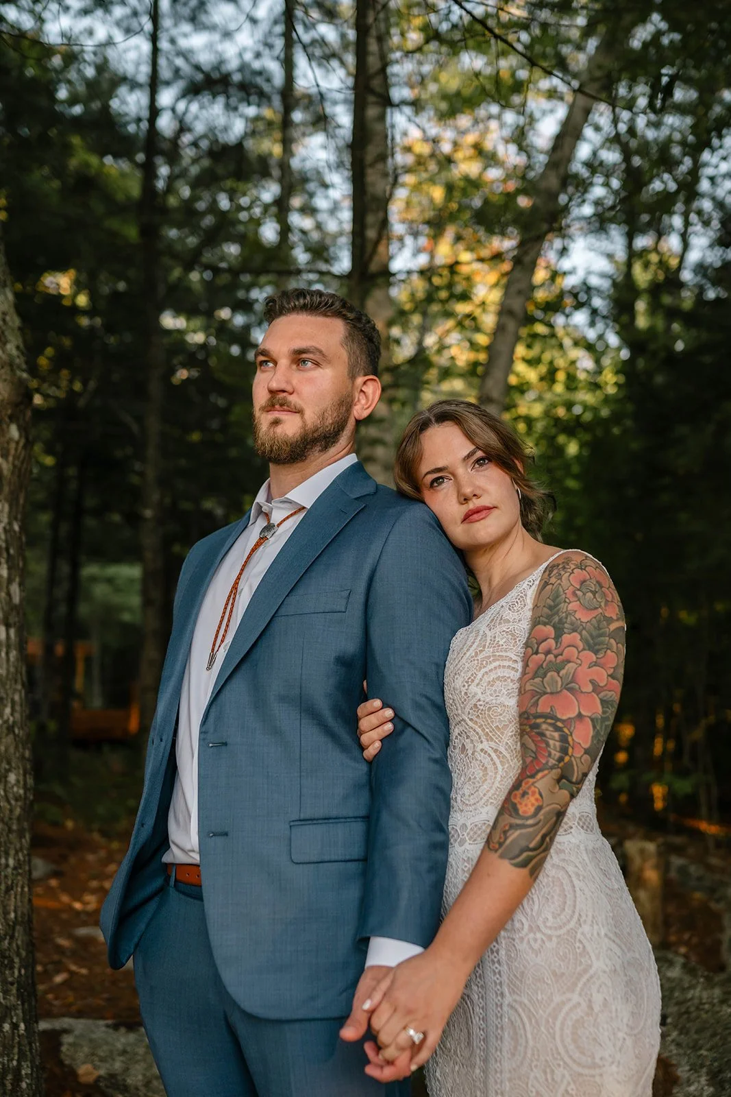 bride and groom in the forest in maine