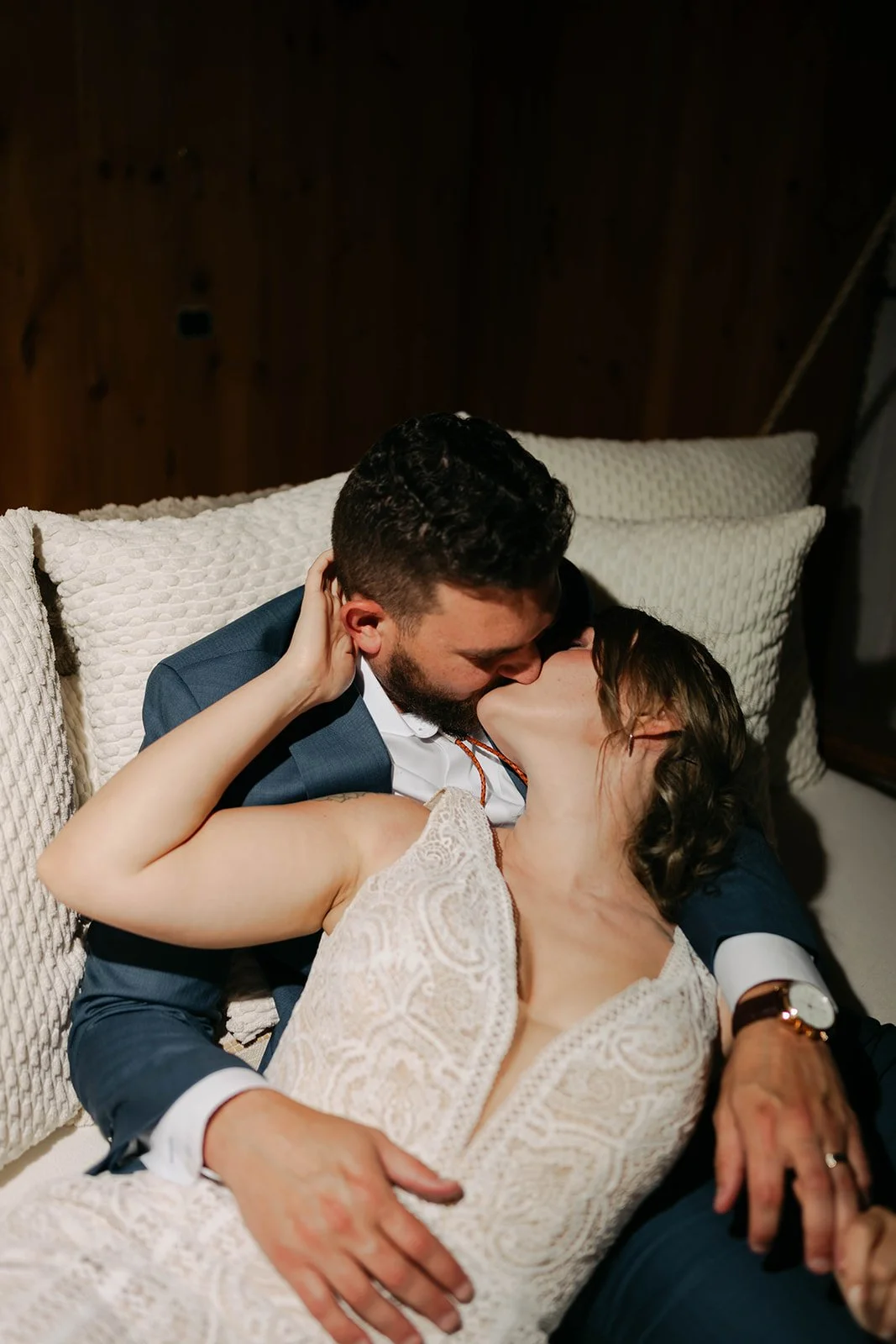 bride and groom in front of the cabin during their maine elopement