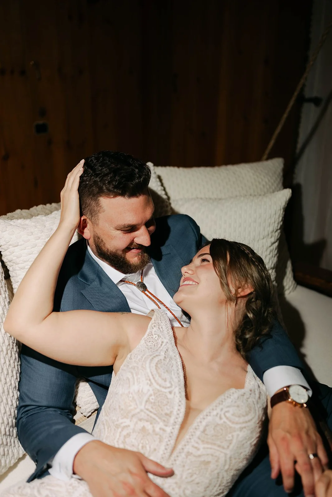 bride and groom in front of the cabin during their maine elopement