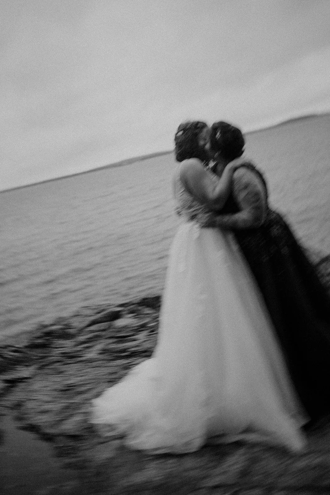 moody lgbtq coastal elopement in acadia national park during sunrise