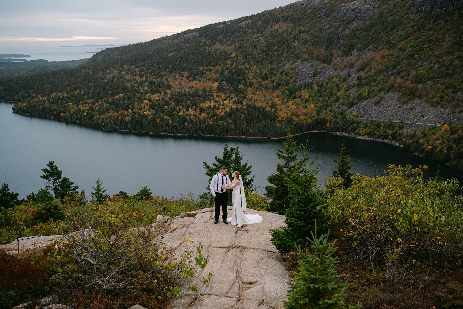 elopement couple on a mountain overlook in acadia national park