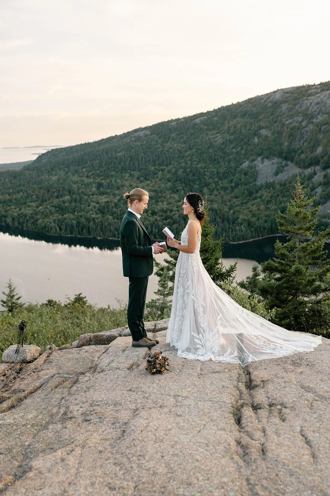 dreamy elopement ceremony at the bubbles in acadia overlooking jordan pond