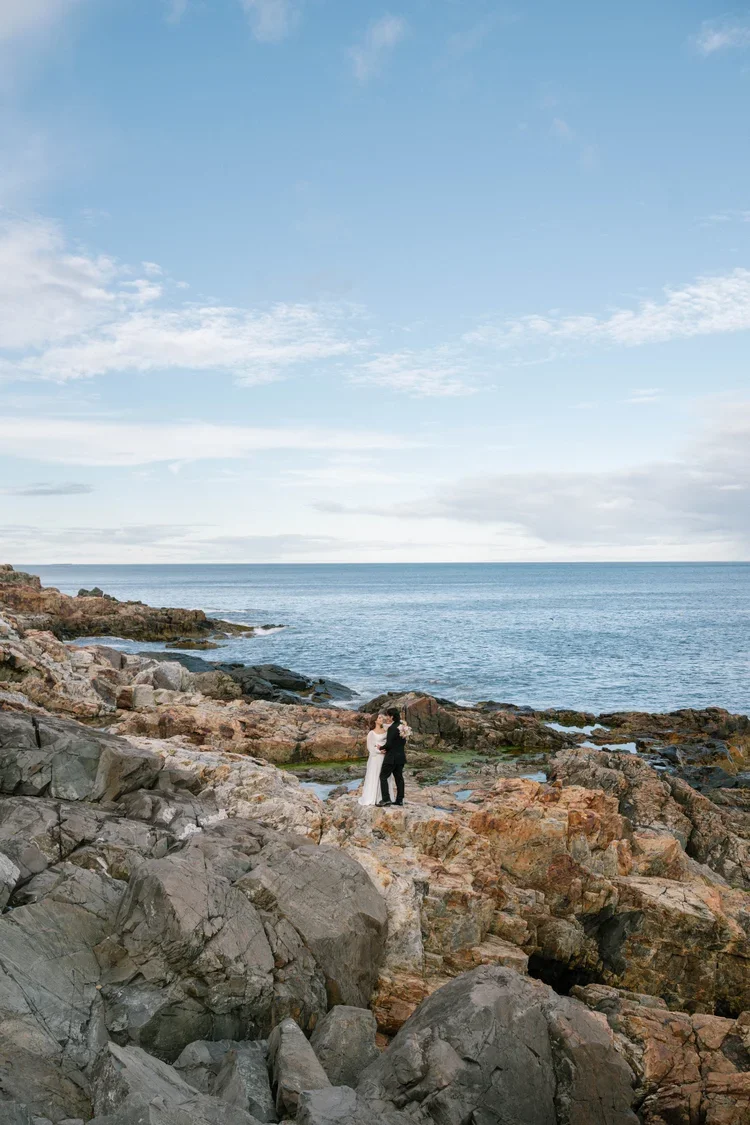 intimate elopement couple on the cliffs at acadia national park