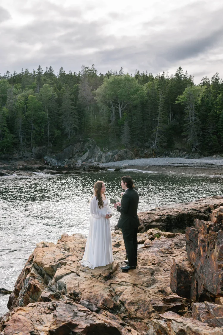 elopement couple exchanging private vows at little hunter's beach