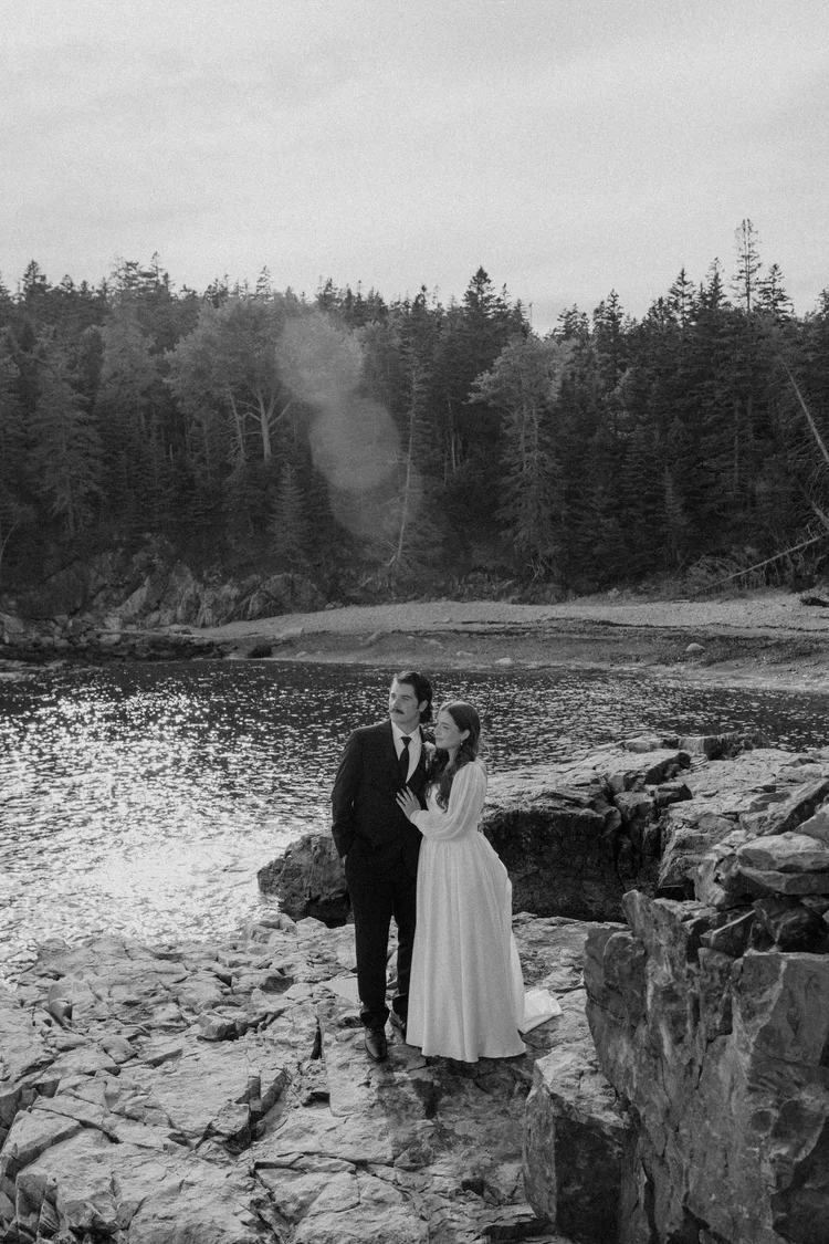 elopement couple exchanging private vows at little hunter's beach