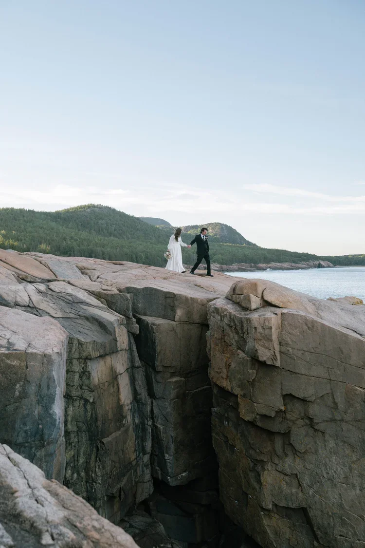 candid bride and groom moments during their elopement at otter cliff overlook in acadia