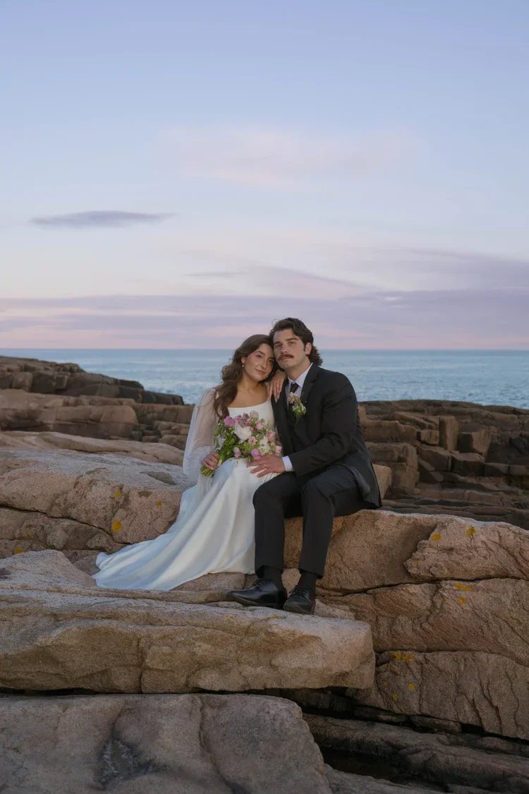 elopement couple at otter point during sunset