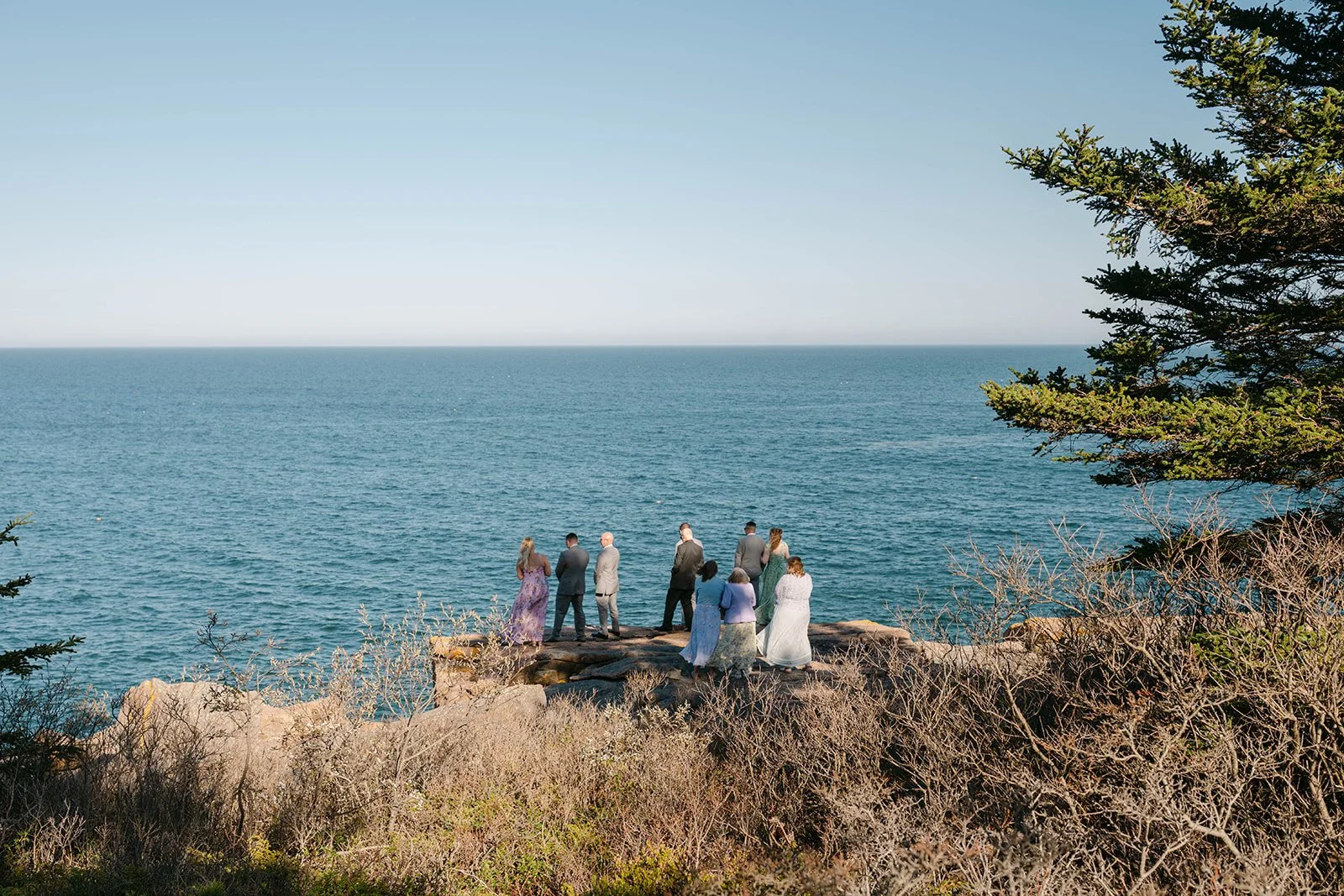 summer elopement ceremony at monument cove