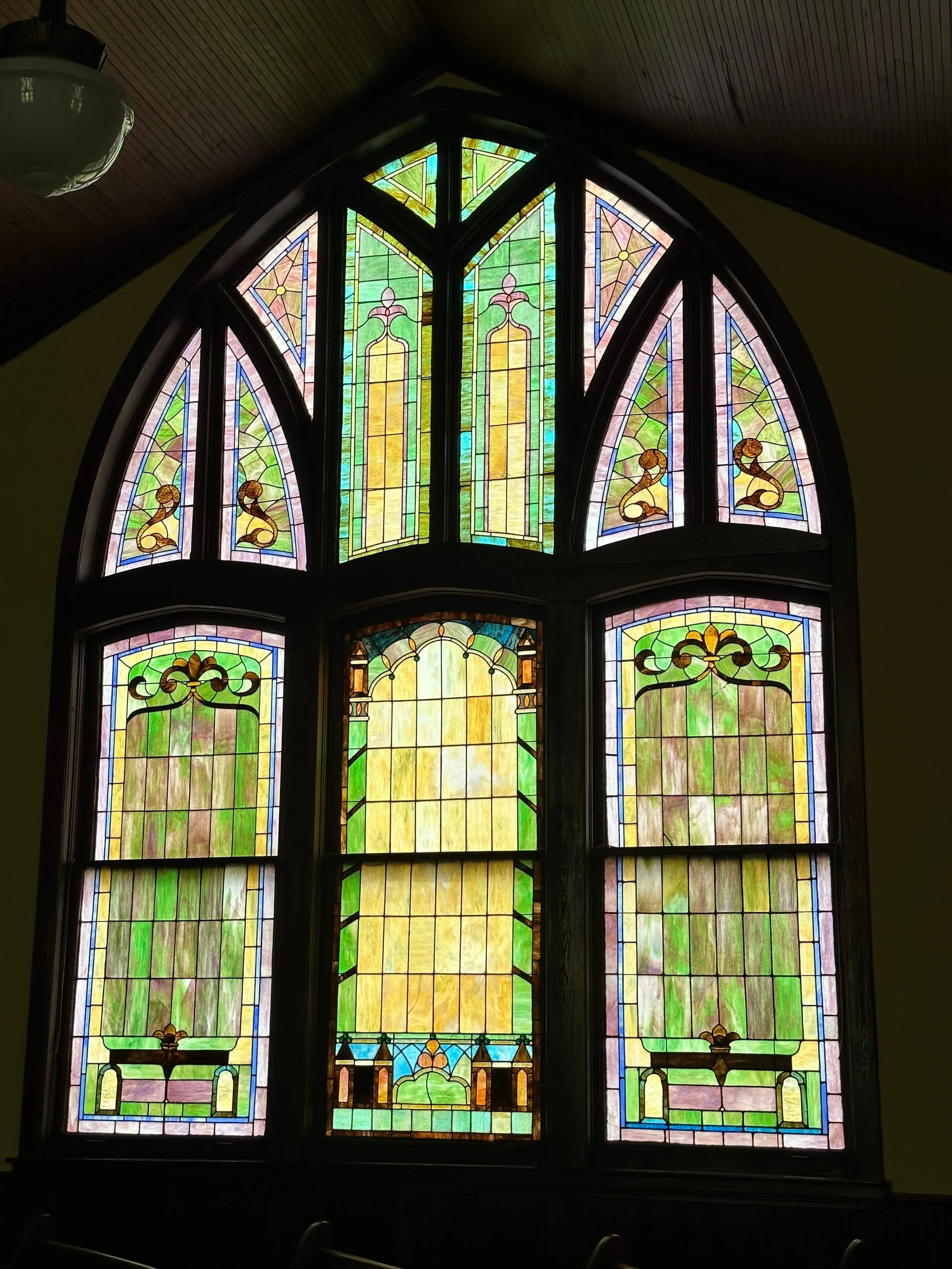 Large stained glass window at Montevallo First United Methodist Church.