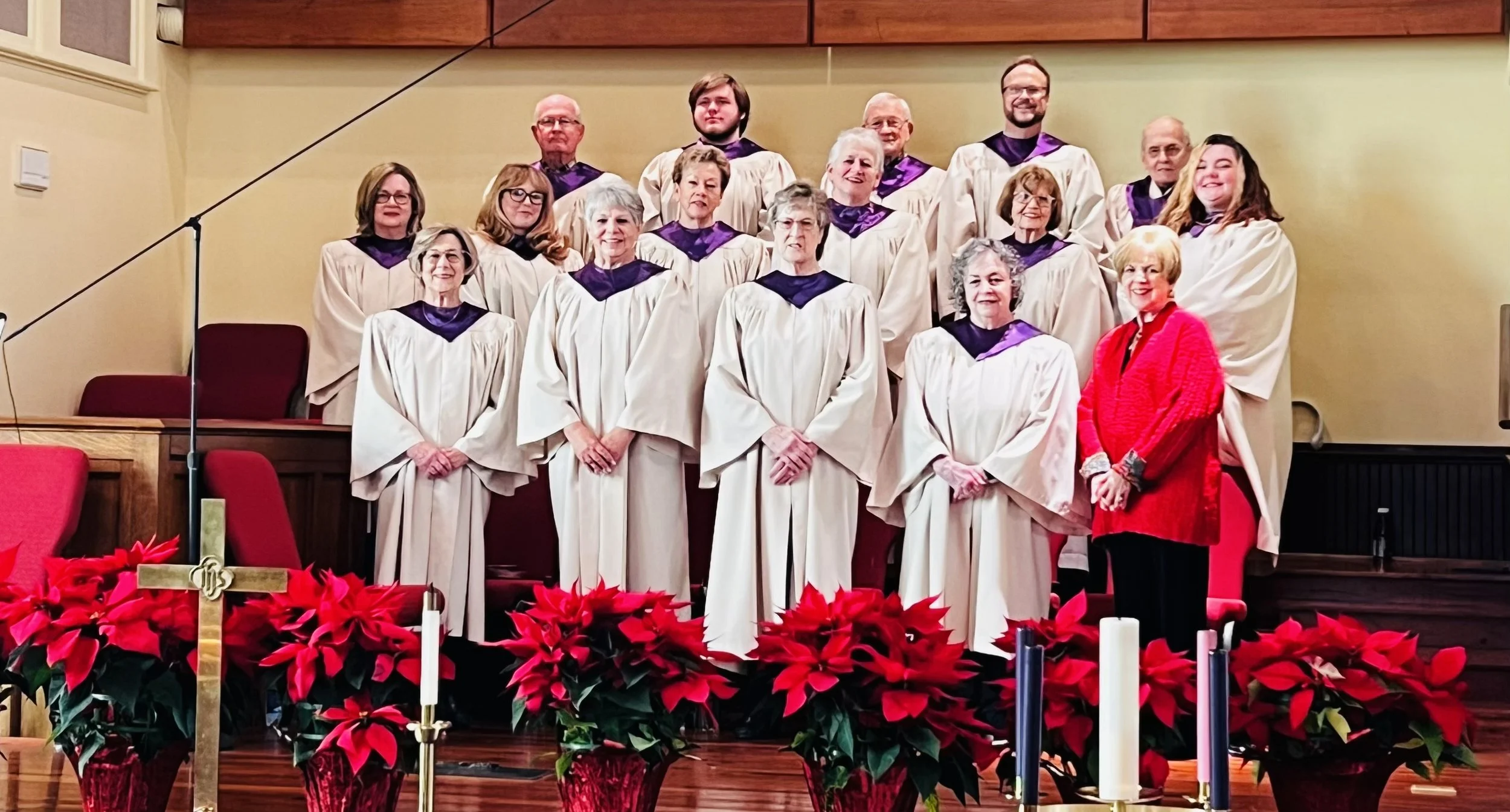 group of choir members standing in the church