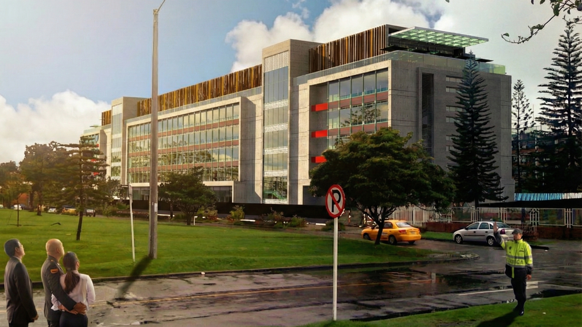 Edificio moderno de oficinas con ventanas de cristal, árboles y vehículos en la calle frente a una zona verde, y una señal de tráfico que indica prohibido estacionar.