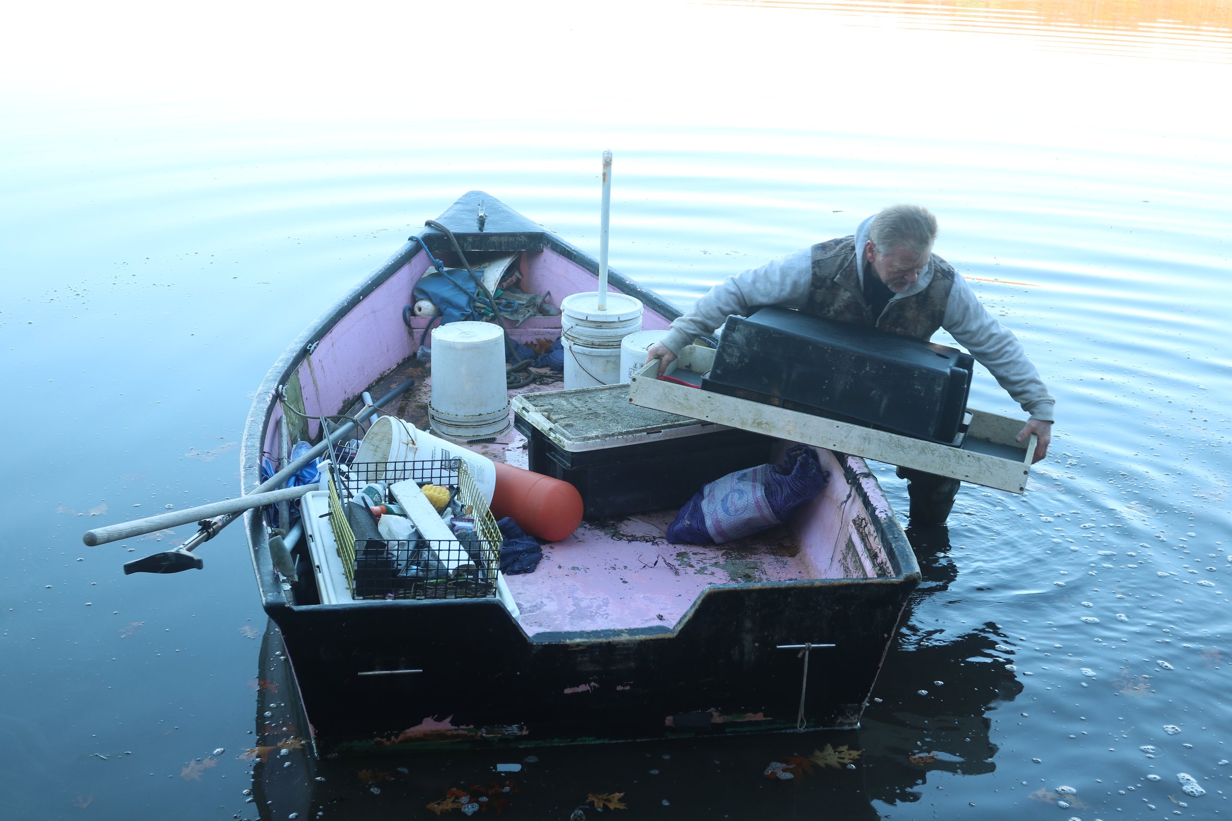 To make room for the oyster bags we'd haul up that day, Terry offloaded his usual gear.