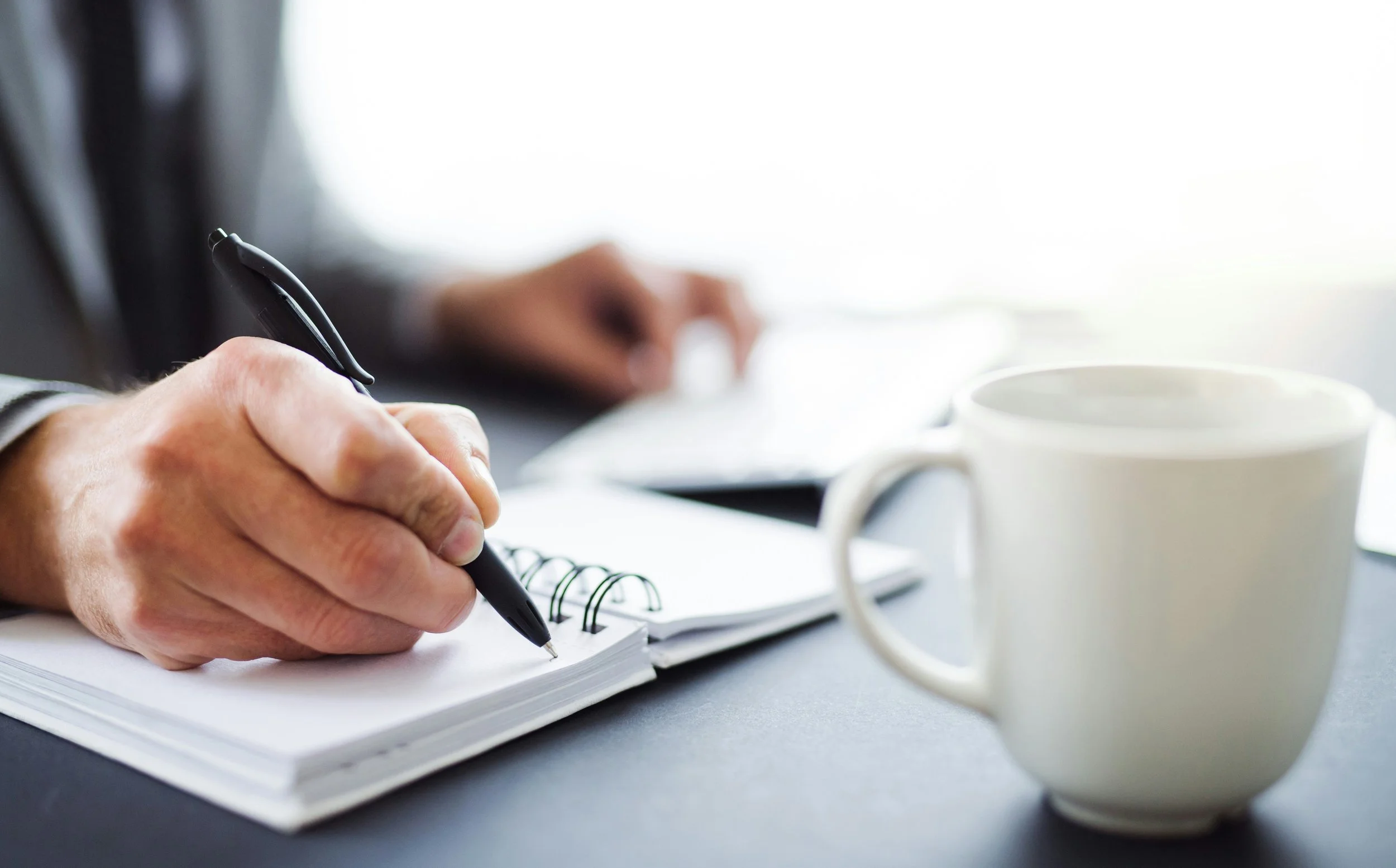 Man taking notes - About - ePsychologists - Alcohol and drug rehab - confidential online psychology - non-judgemental alcohol and drug therapy - is my alcohol use high - is my drug use bad