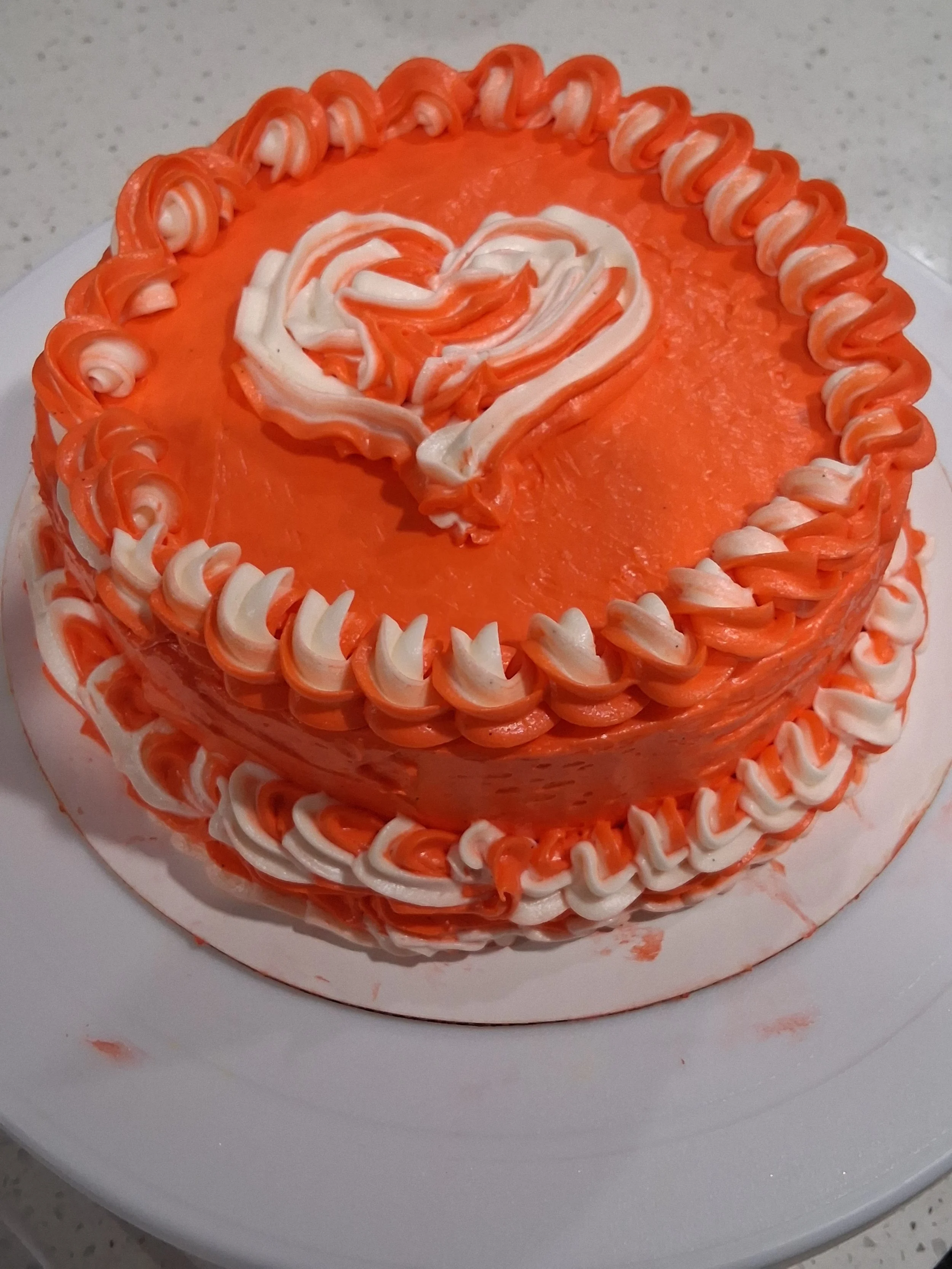 peach and white circle with heart.jpg