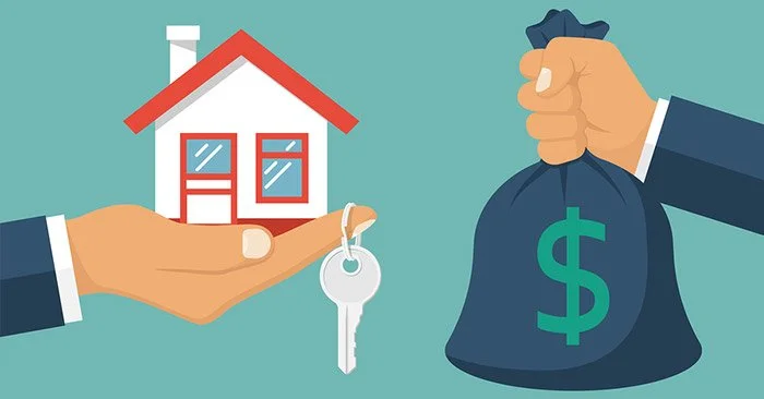 A hand holding a small house with a key, and another hand holding a money bag with a dollar sign, representing real estate or property purchase.