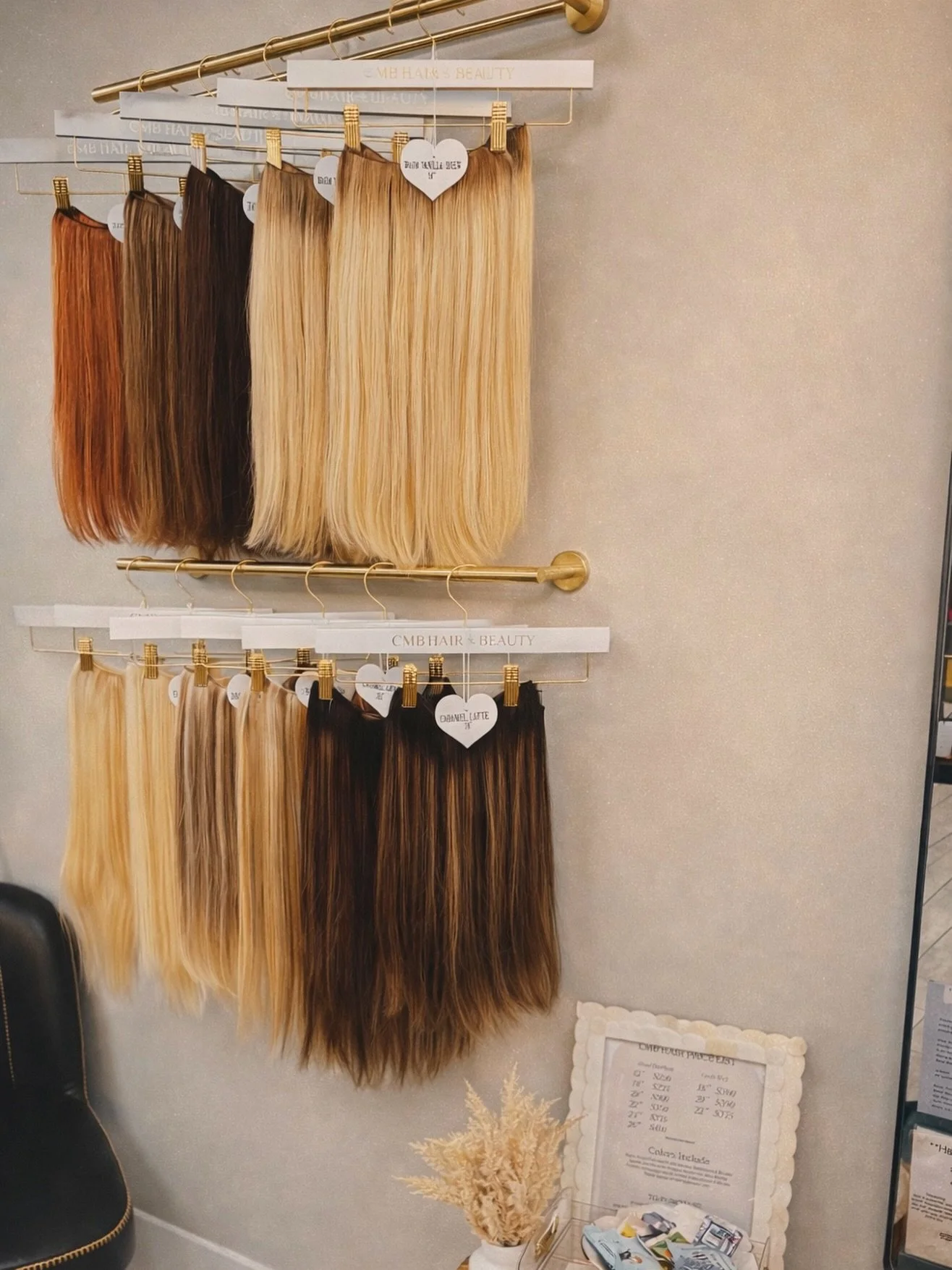 If you&rsquo;ve been in the salon lately&hellip; you&rsquo;ve seen it 👀
Our in-salon extension display is officially up&mdash;and almost fully stocked 🤍
.
Whether you&rsquo;re going lighter, adding length, or just want a little extra fullness&helli