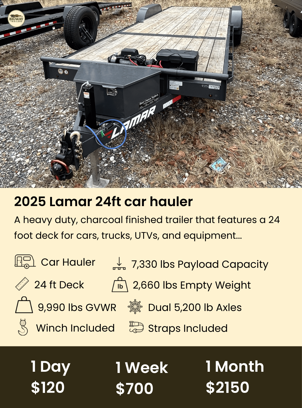 A 2025 Lamar 24ft car hauler trailer with a charcoal finish, featuring a 24-foot deck, parked on gravel. The trailer has a black toolbox, a battery, and chains in the front, with fenders over the wheels and a wooden deck for transporting vehicles and equipment.