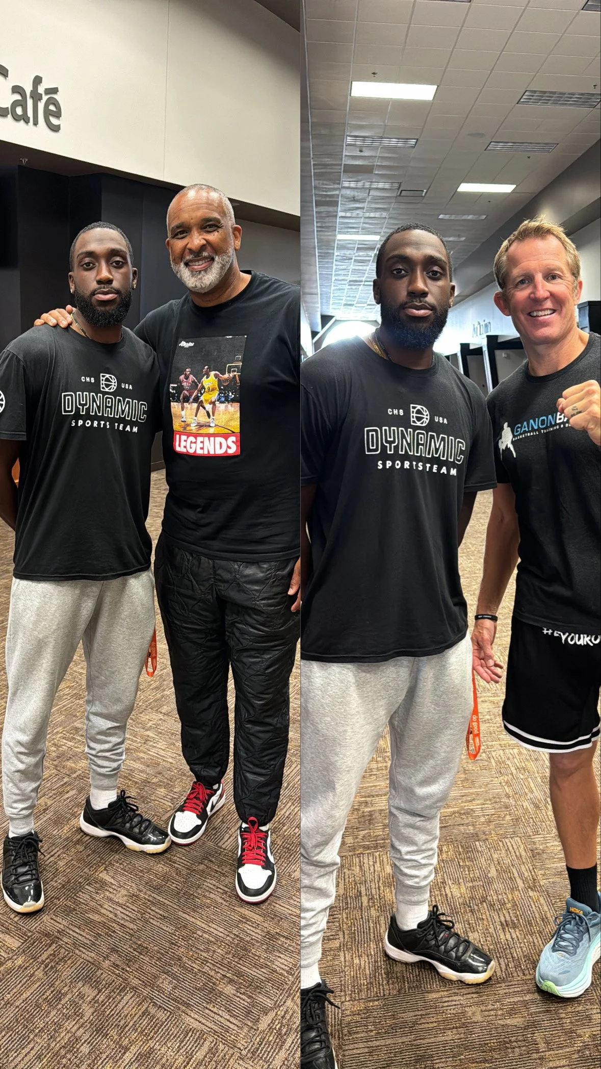 Two men in t-shirts and athletic pants standing indoors with a third man, all smiling at the camera.