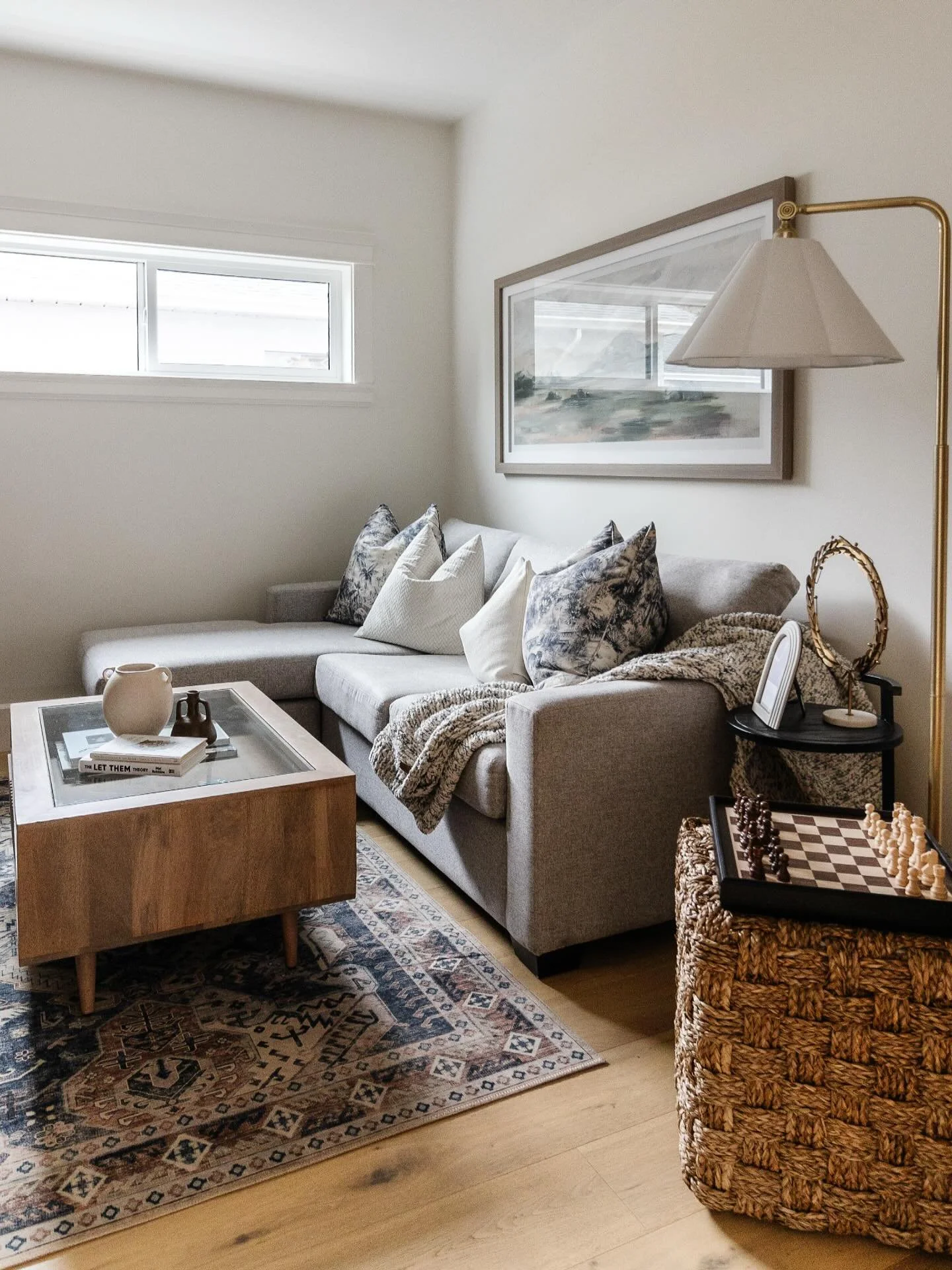 Multi-functional, intentionally designed.

This curated den transitions seamlessly from a relaxed TV room to a considered guest space. Anchored by a custom L-shaped sofa that converts into a queen-size bed, every element is selected for both beauty a