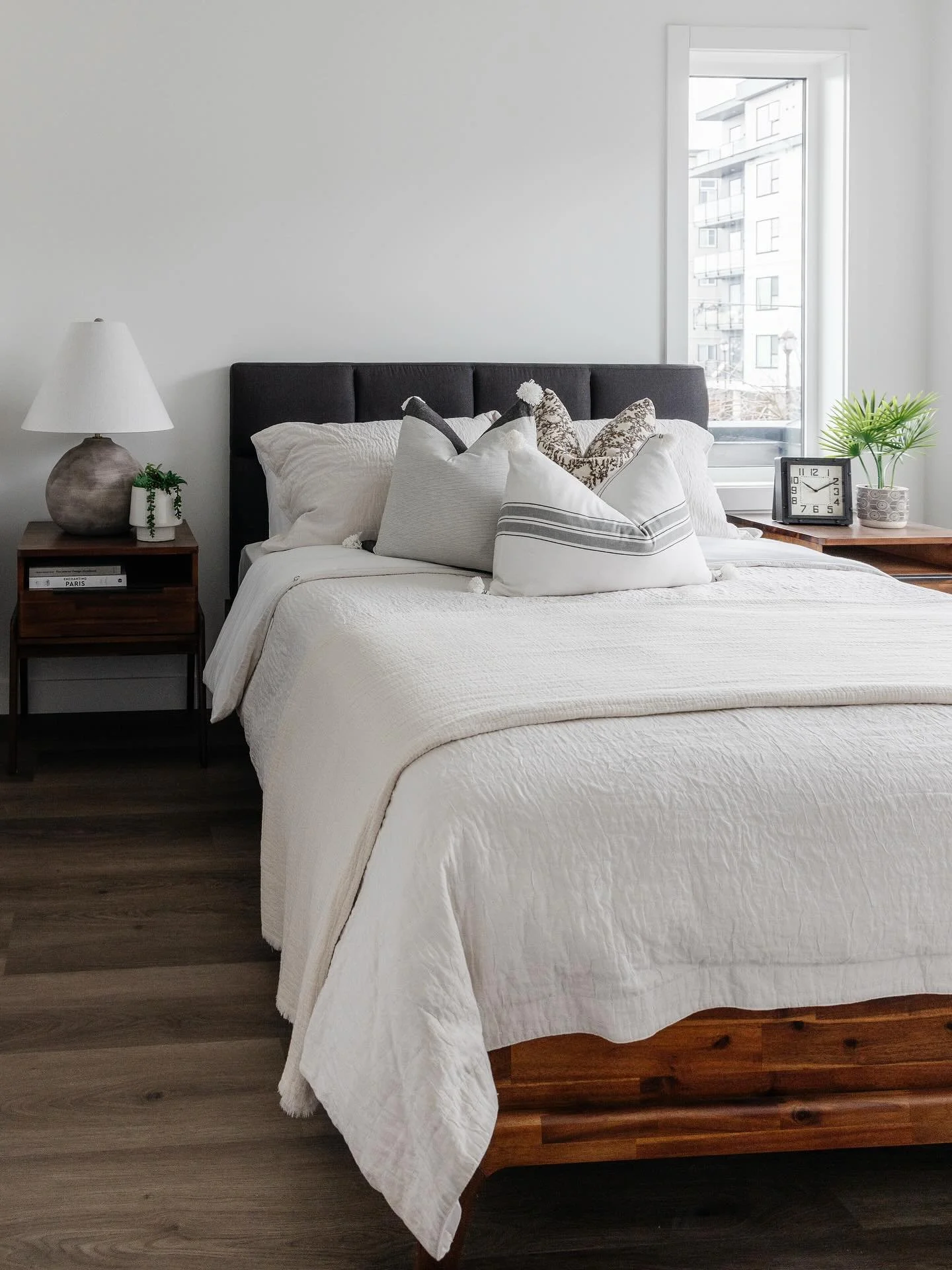 Calm, layered, and intentionally styled.

This Gordon Place - 831 Orono Avenue, bedroom is designed as a quiet retreat &mdash; where soft textures, warm tones, and considered furnishings come together with ease. Every element is chosen for both comfo
