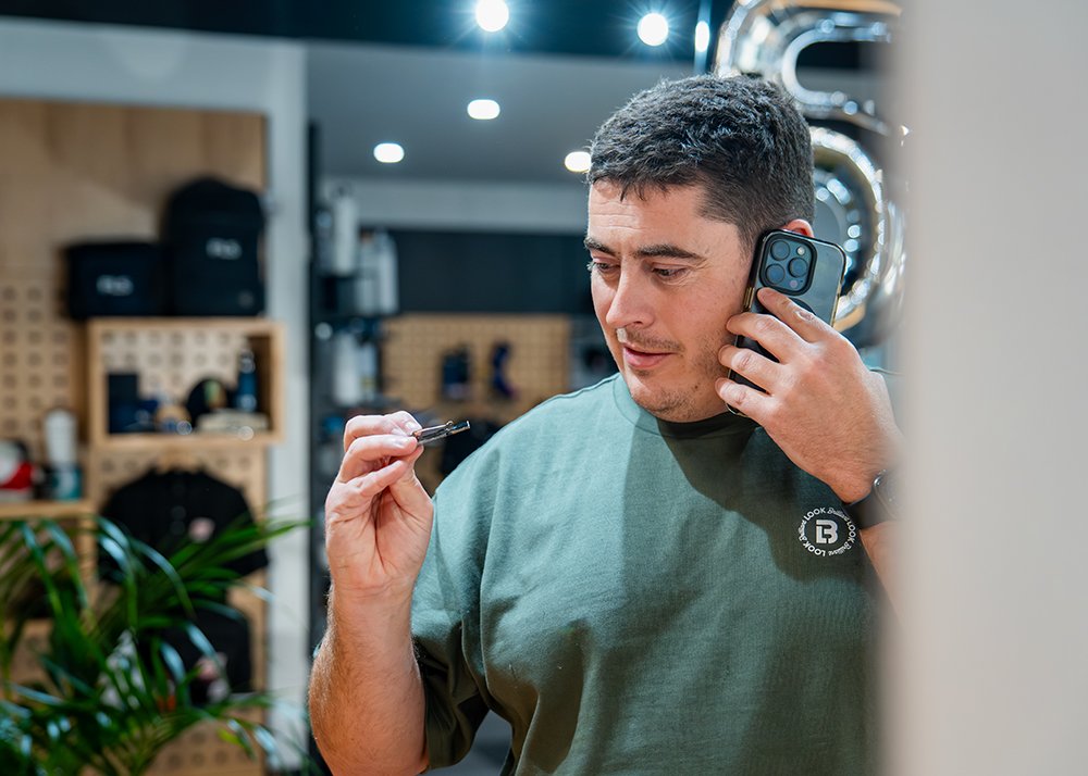 Look Brilliant employee admiring custom pin label