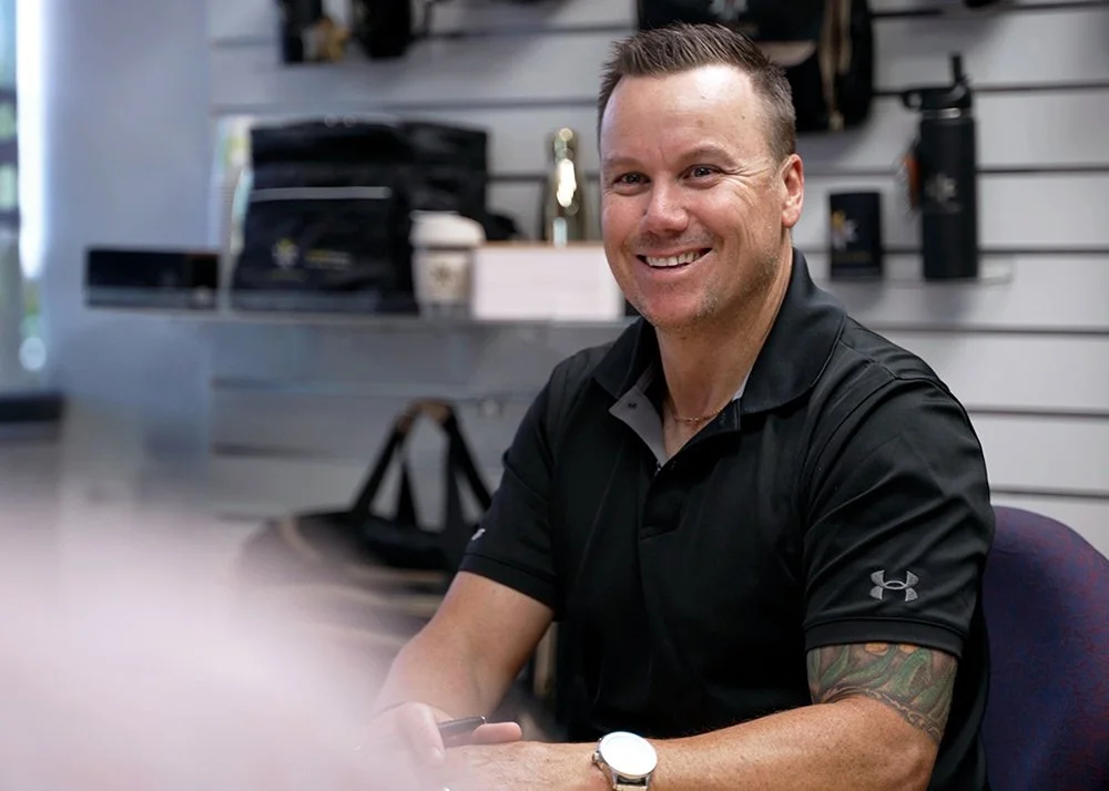 Smiling Look Brilliant employee talking to a client