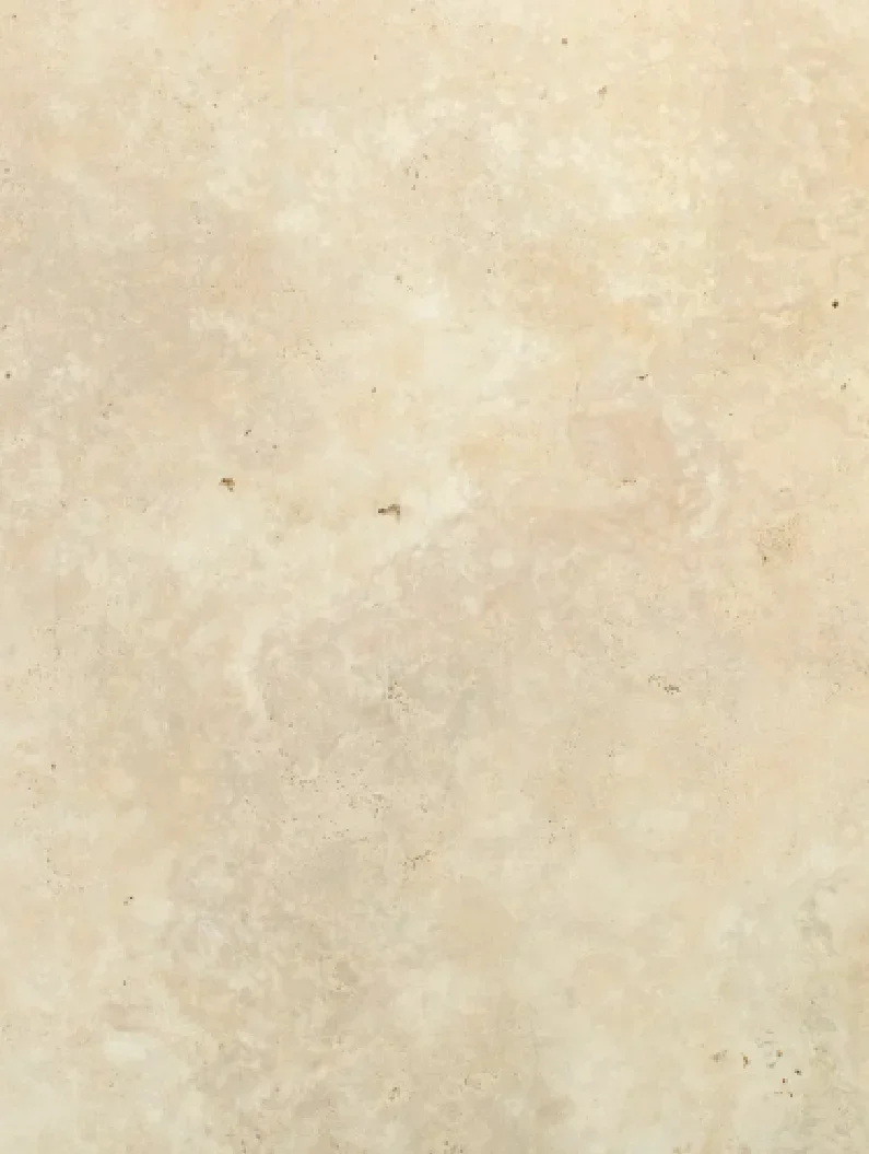 A close-up view of a beige, slightly textured surface, likely a wall or floor tile.