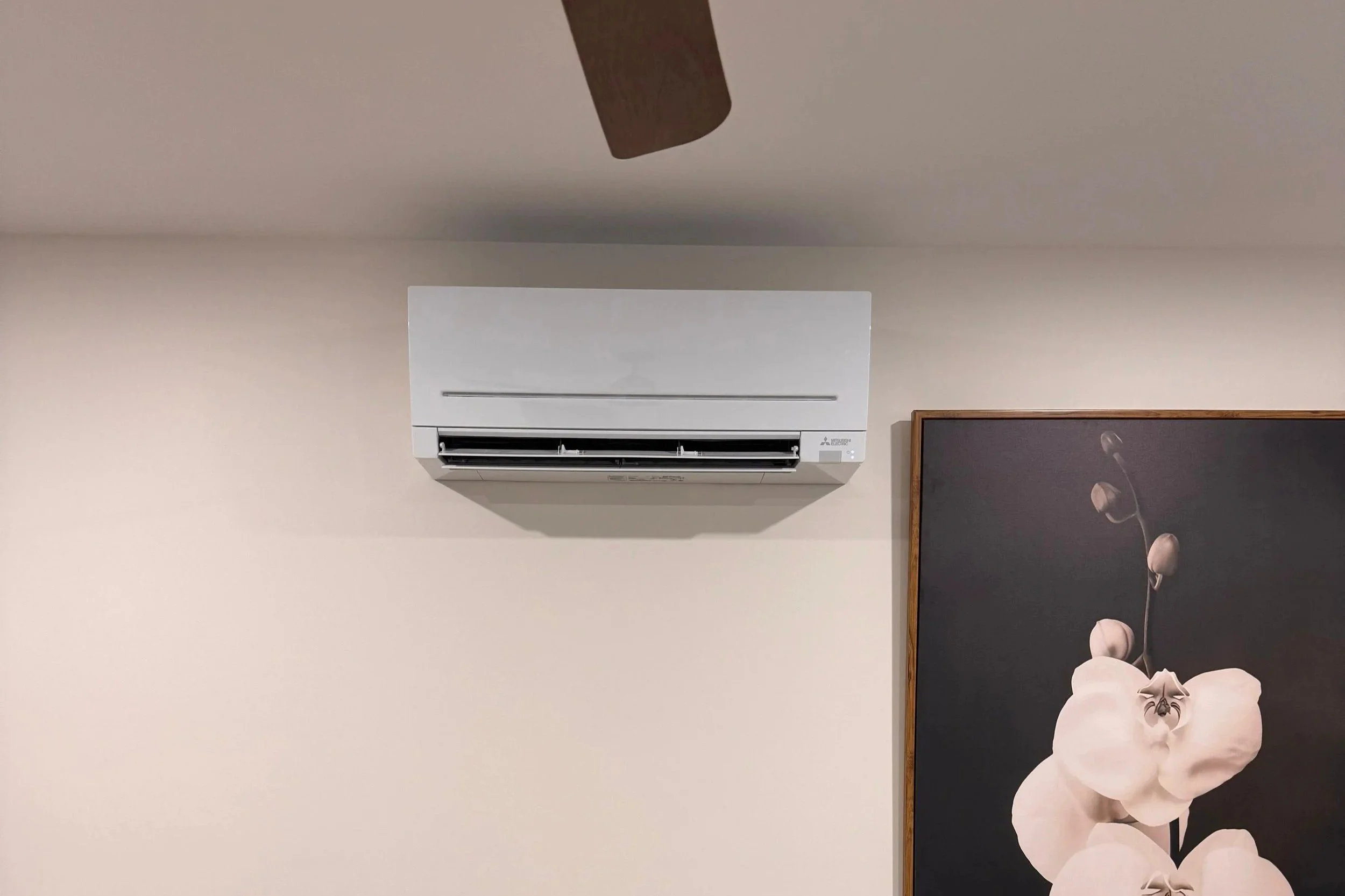 Energy-efficient air conditioning installation in Queensland home living area.