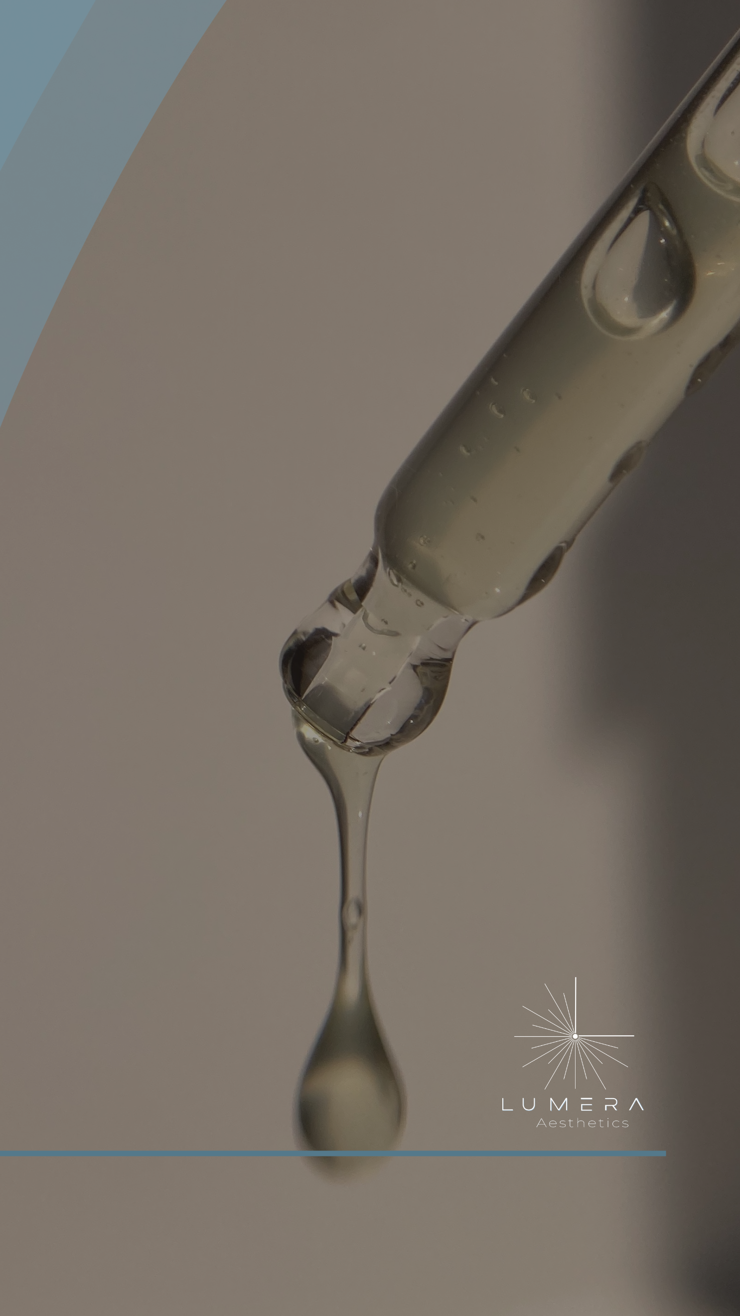 Close-up of a dropper with a clear liquid forming a droplet at the tip. The background is neutral, and there is a logo with the text ‘LUMERA Aesthetics’ in the bottom right corner.